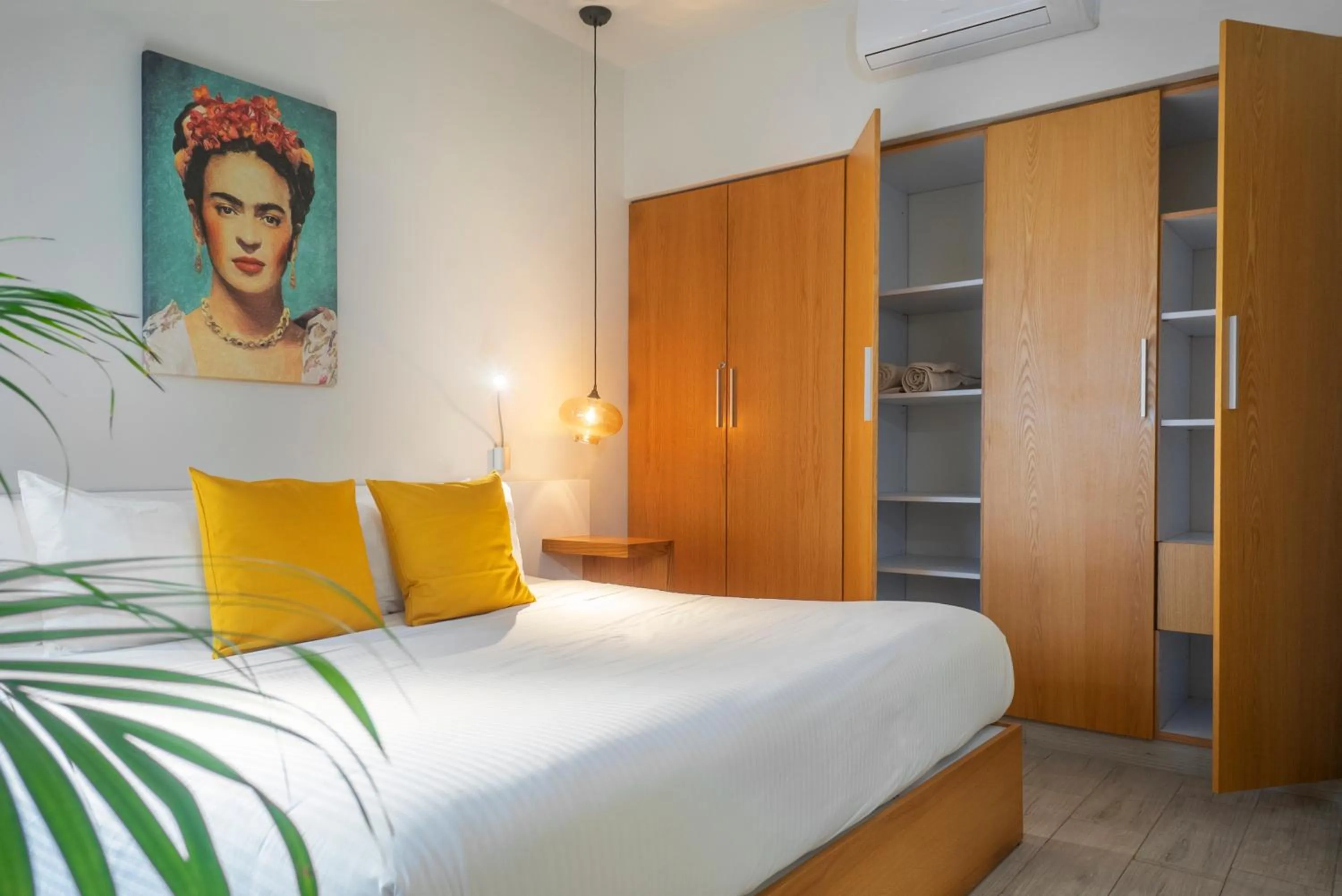 Bed in Opal Suites Apartments