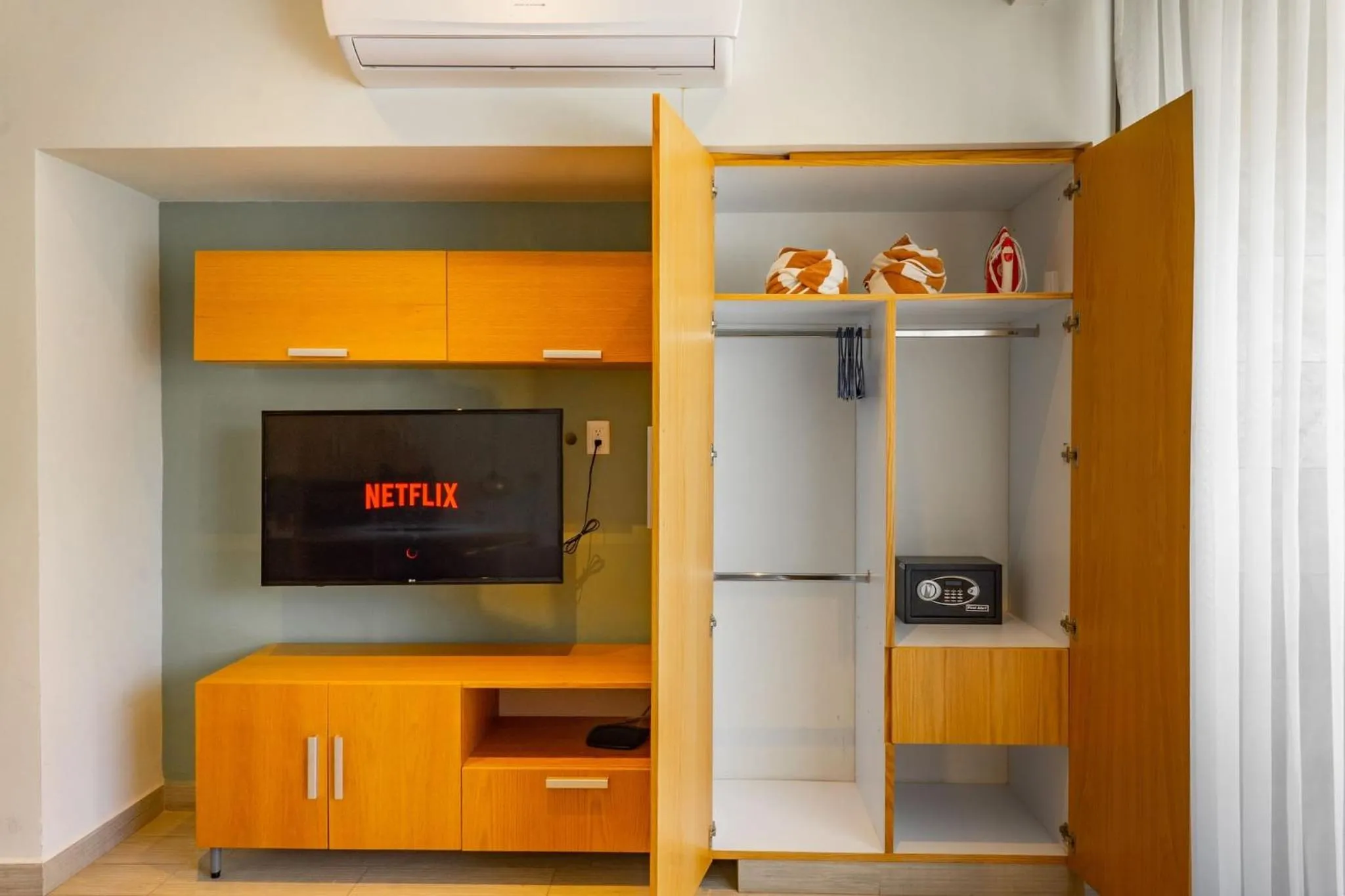 Bed in Opal Suites Apartments