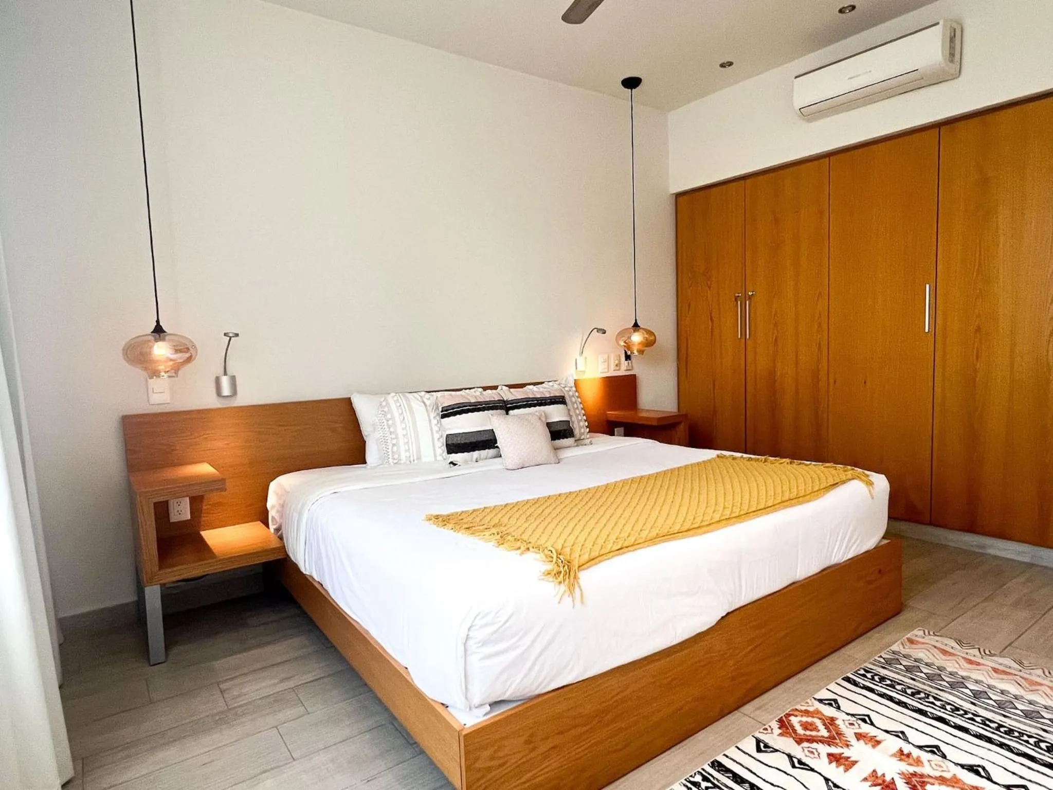 Bed in Opal Suites Apartments