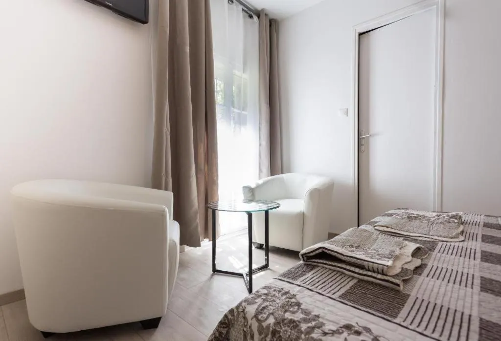 Bed in Hotel Alizéa