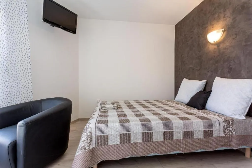 Bed in Hotel Alizéa