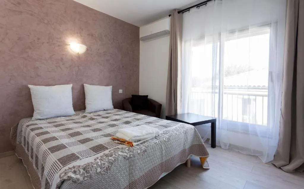 Bed in Hotel Alizéa