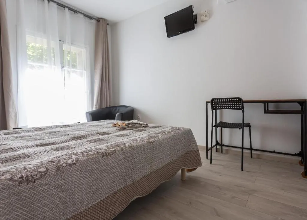 Bed in Hotel Alizéa