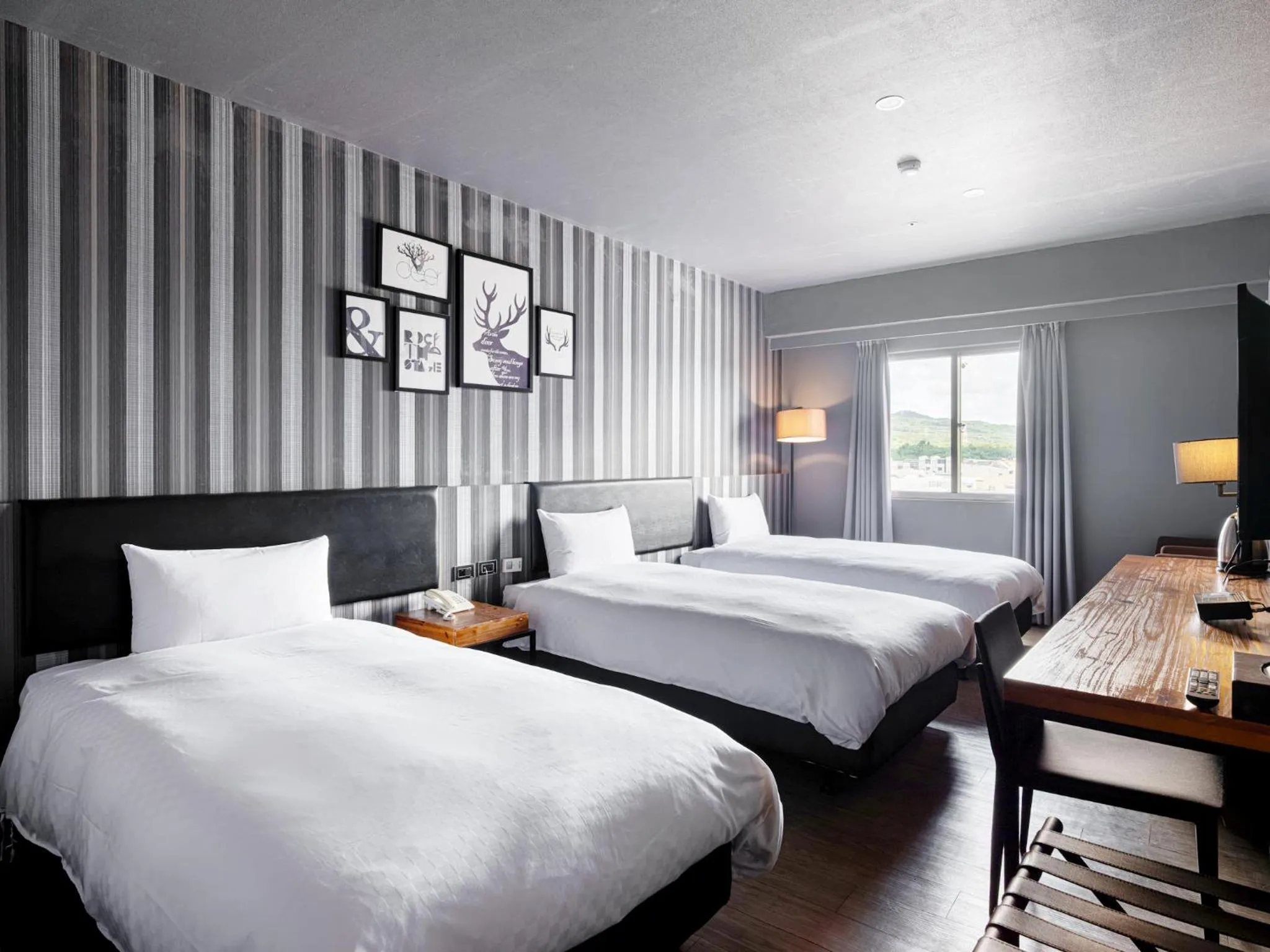 Photo of the whole room, Bed in GUIDE HOTEL Kenting Resort