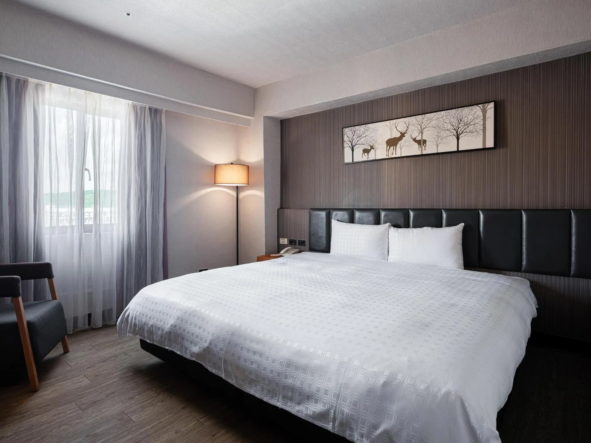 Photo of the whole room, Bed in GUIDE HOTEL Kenting Resort