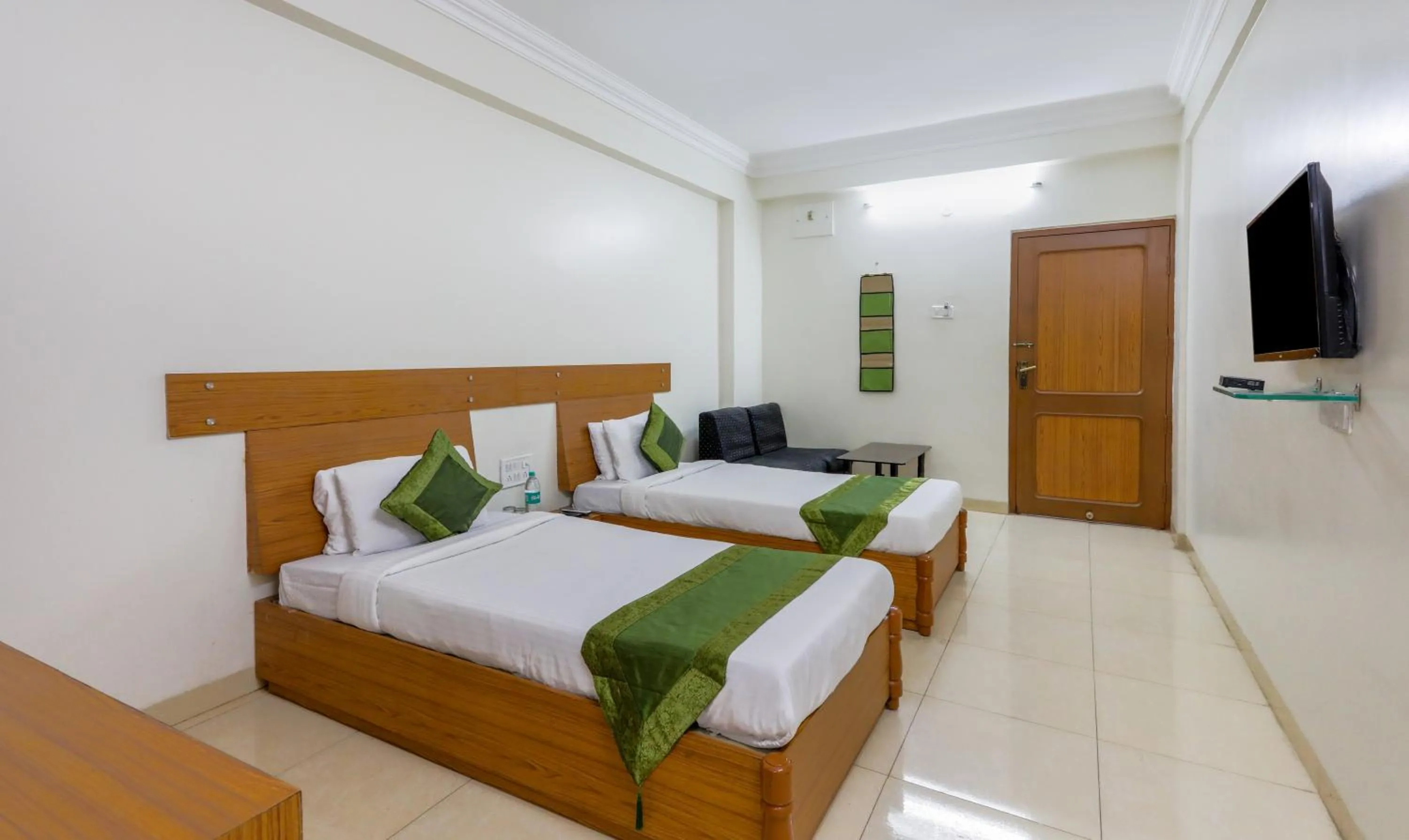 Bed in Treebo Omni Palace