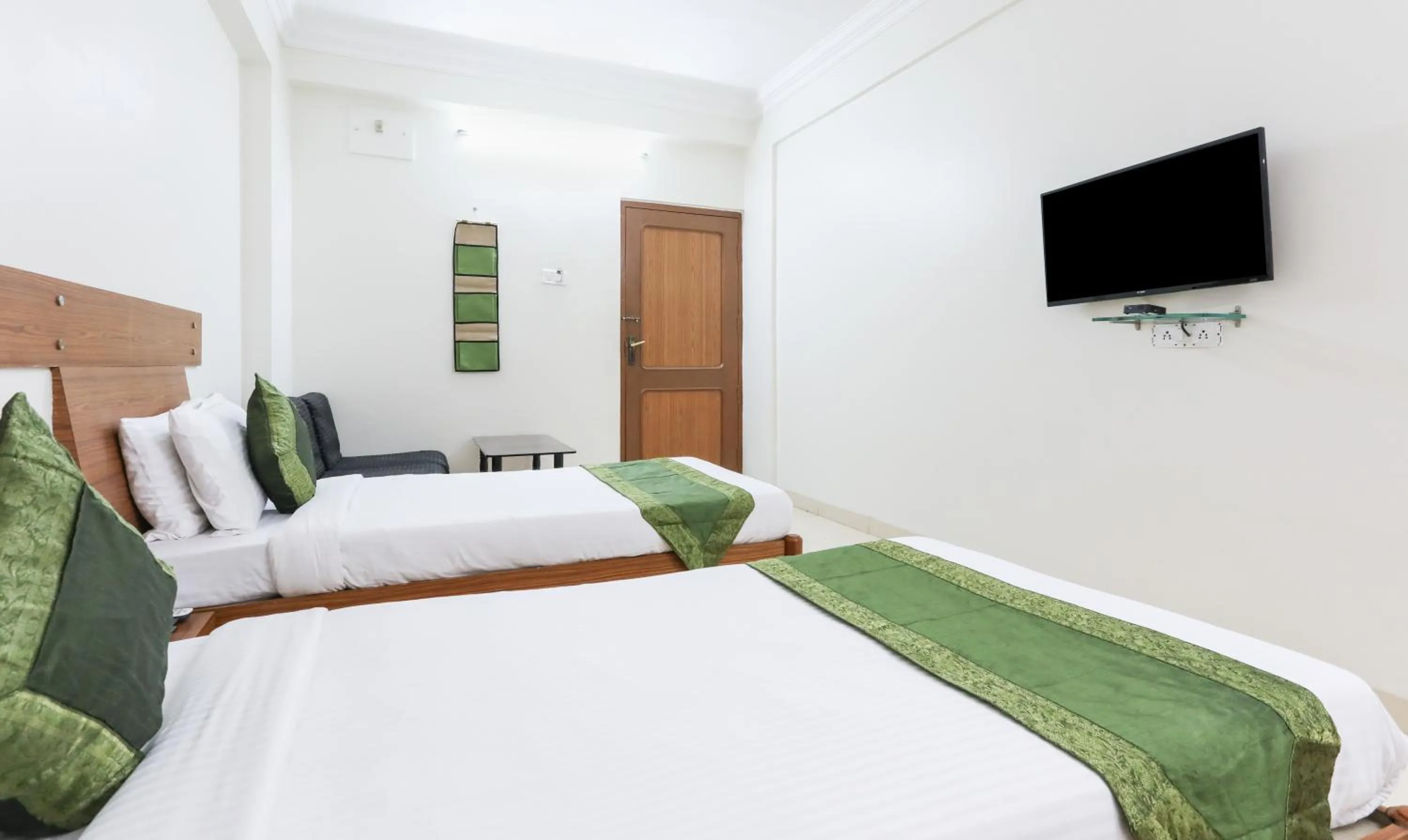 Bed in Treebo Omni Palace