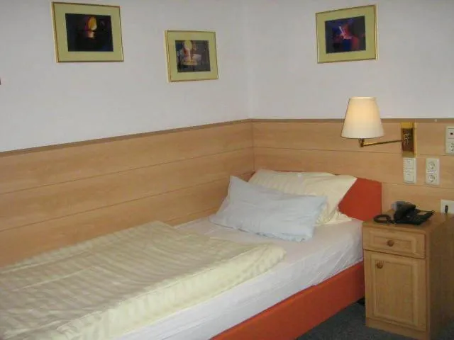 Bed in Gasthaus Laubacher Wald