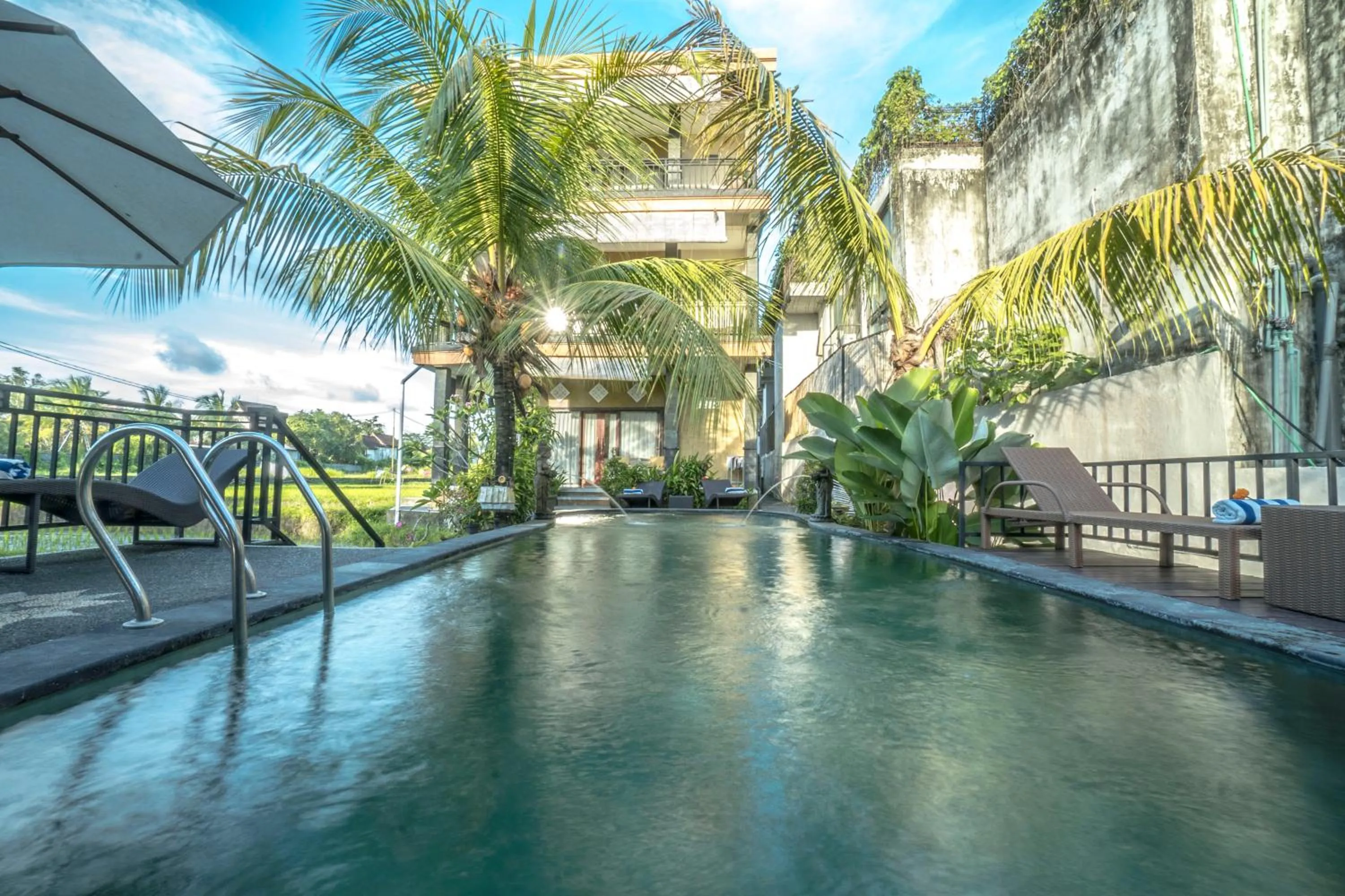 Swimming pool in Adi Bisma Inn by Mahaputra-CHSE Certified