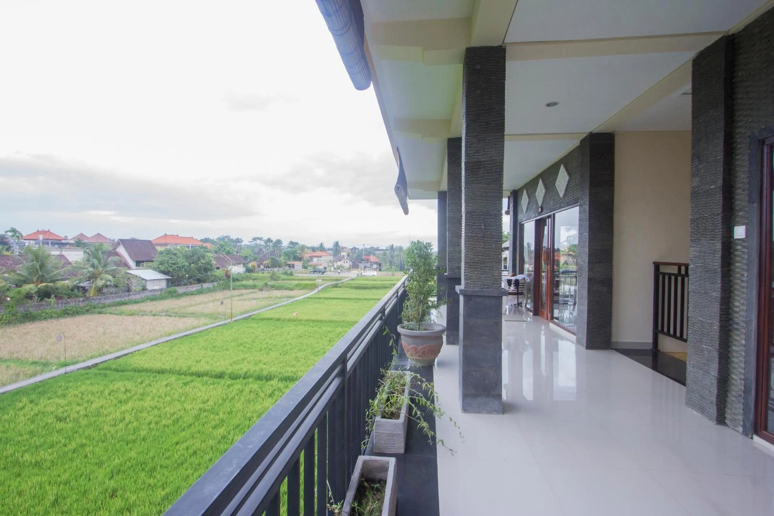 Balcony/Terrace in Adi Bisma Inn by Mahaputra-CHSE Certified