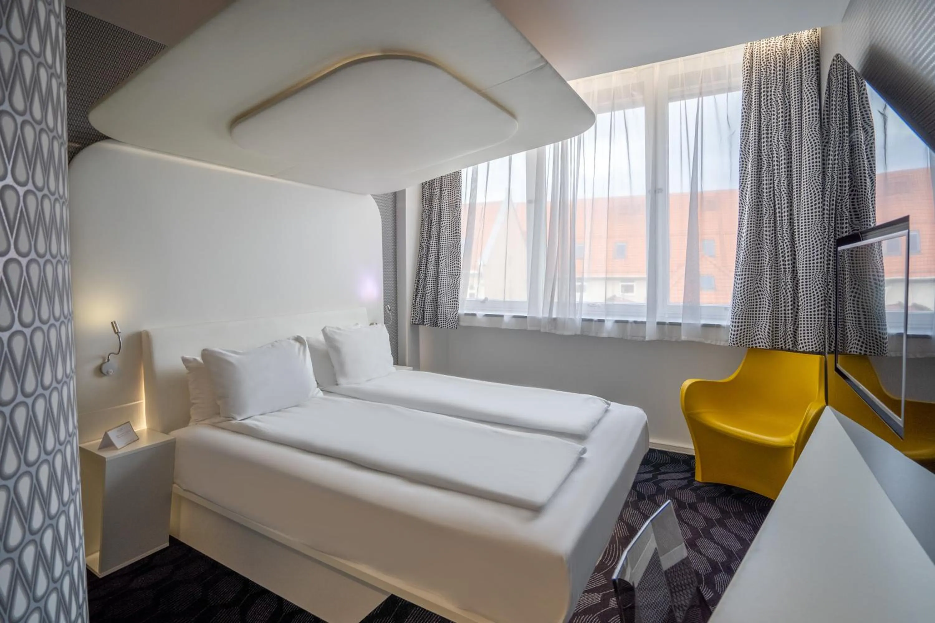 Bed in Magic Hotel Bergen City Center, a member of Radisson Individuals