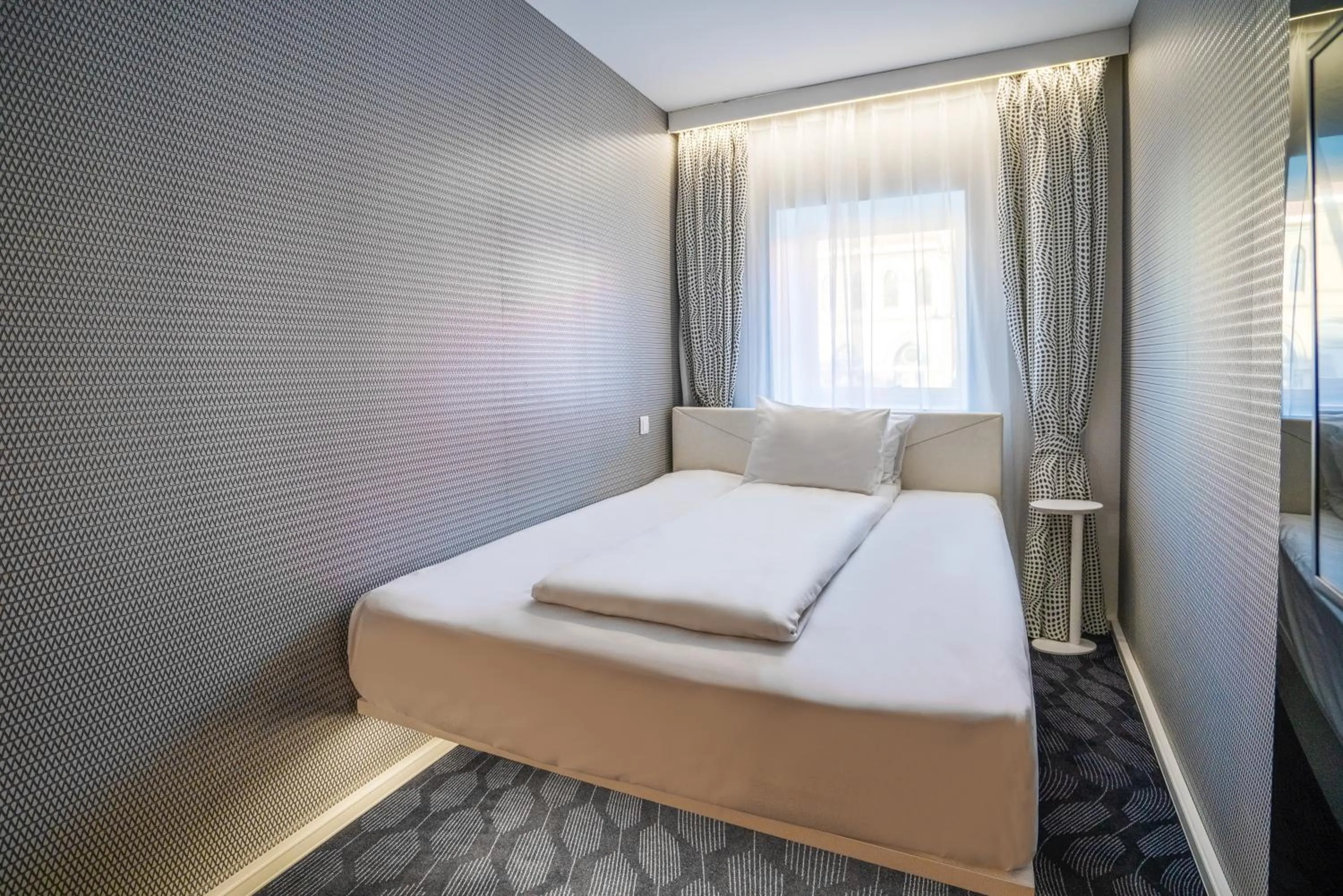 Bed in Magic Hotel Bergen City Center, a member of Radisson Individuals