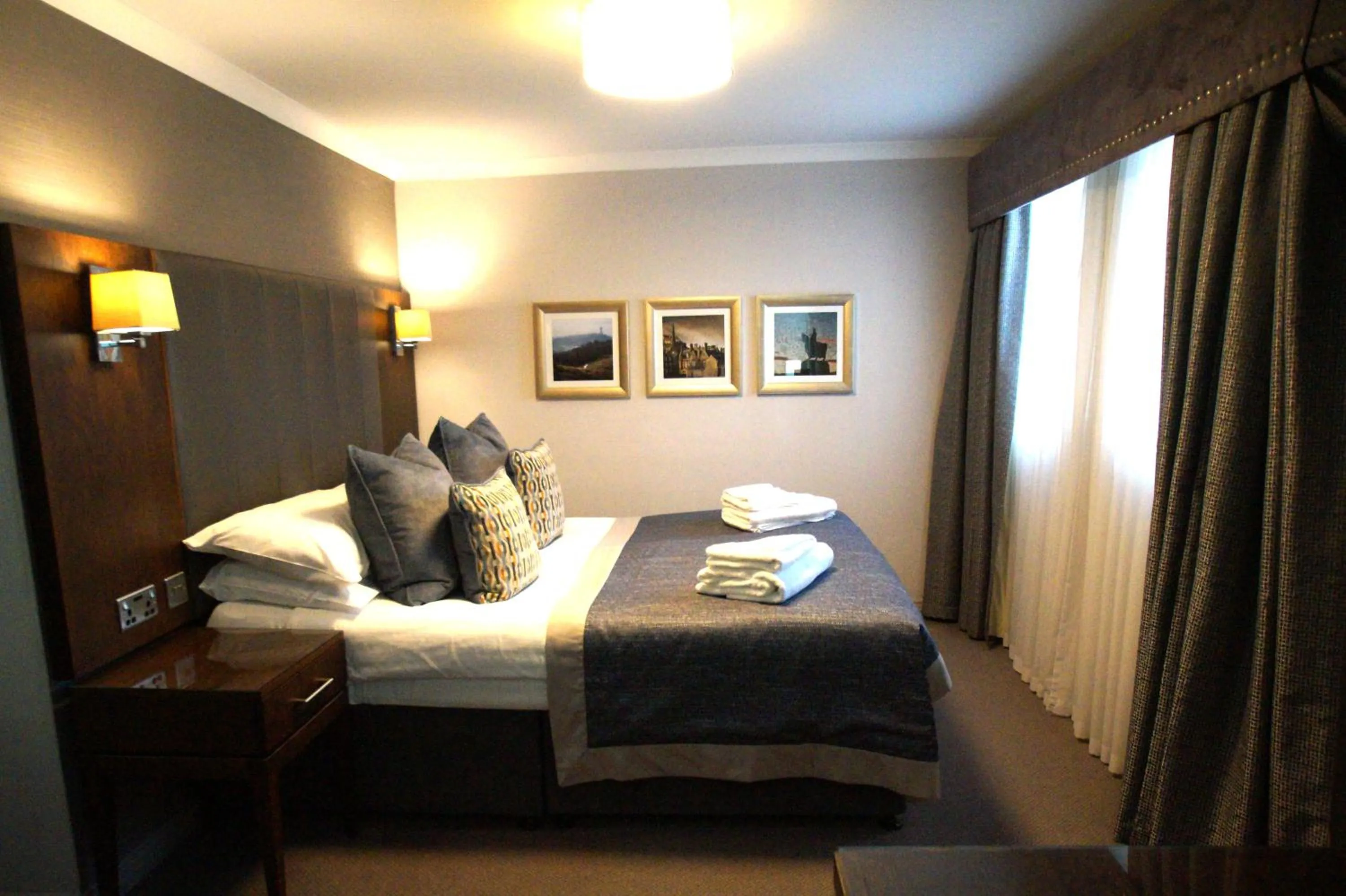 Bed in Golden Lion Hotel