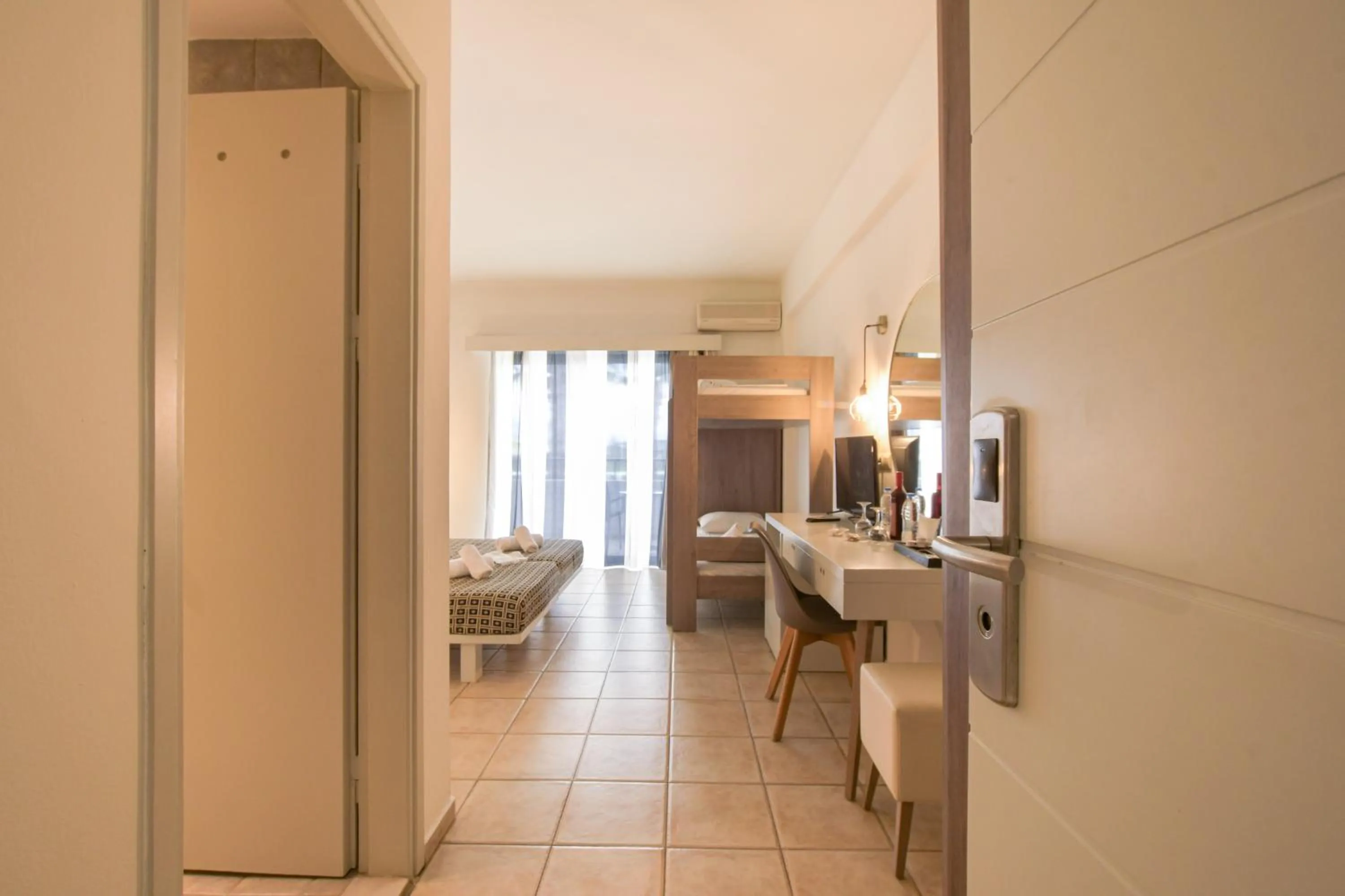 Photo of the whole room, Bed in Gouves Bay by Omilos Hotels