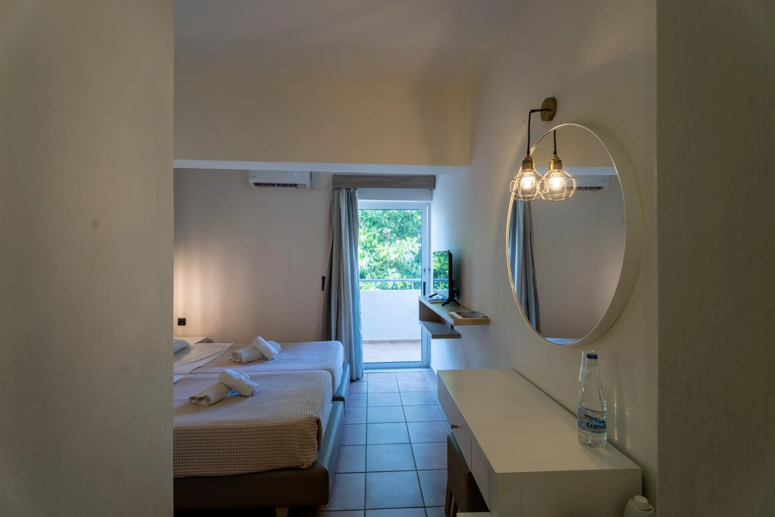 Bathroom, Bed in Gouves Bay by Omilos Hotels