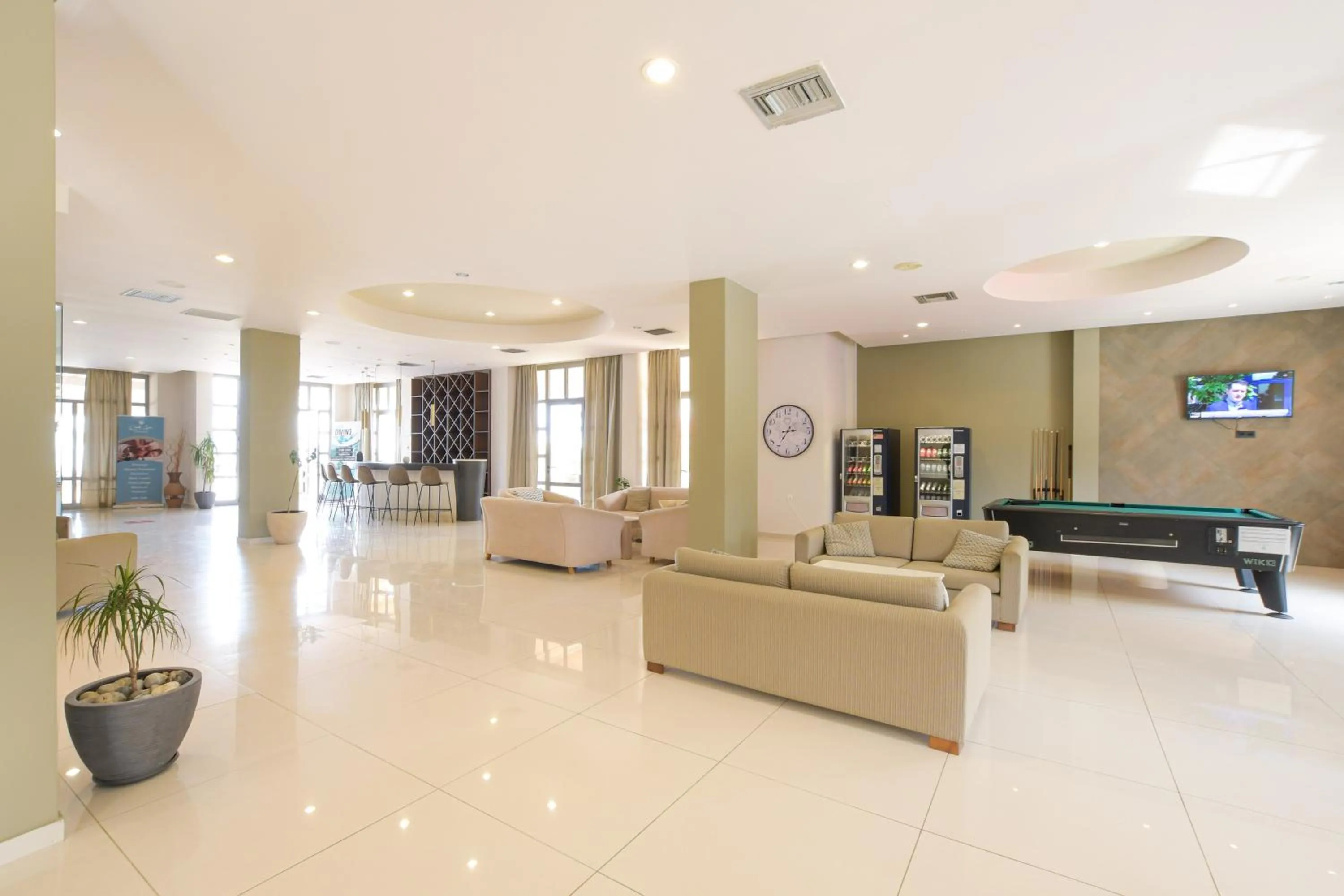 Living room in Gouves Bay by Omilos Hotels