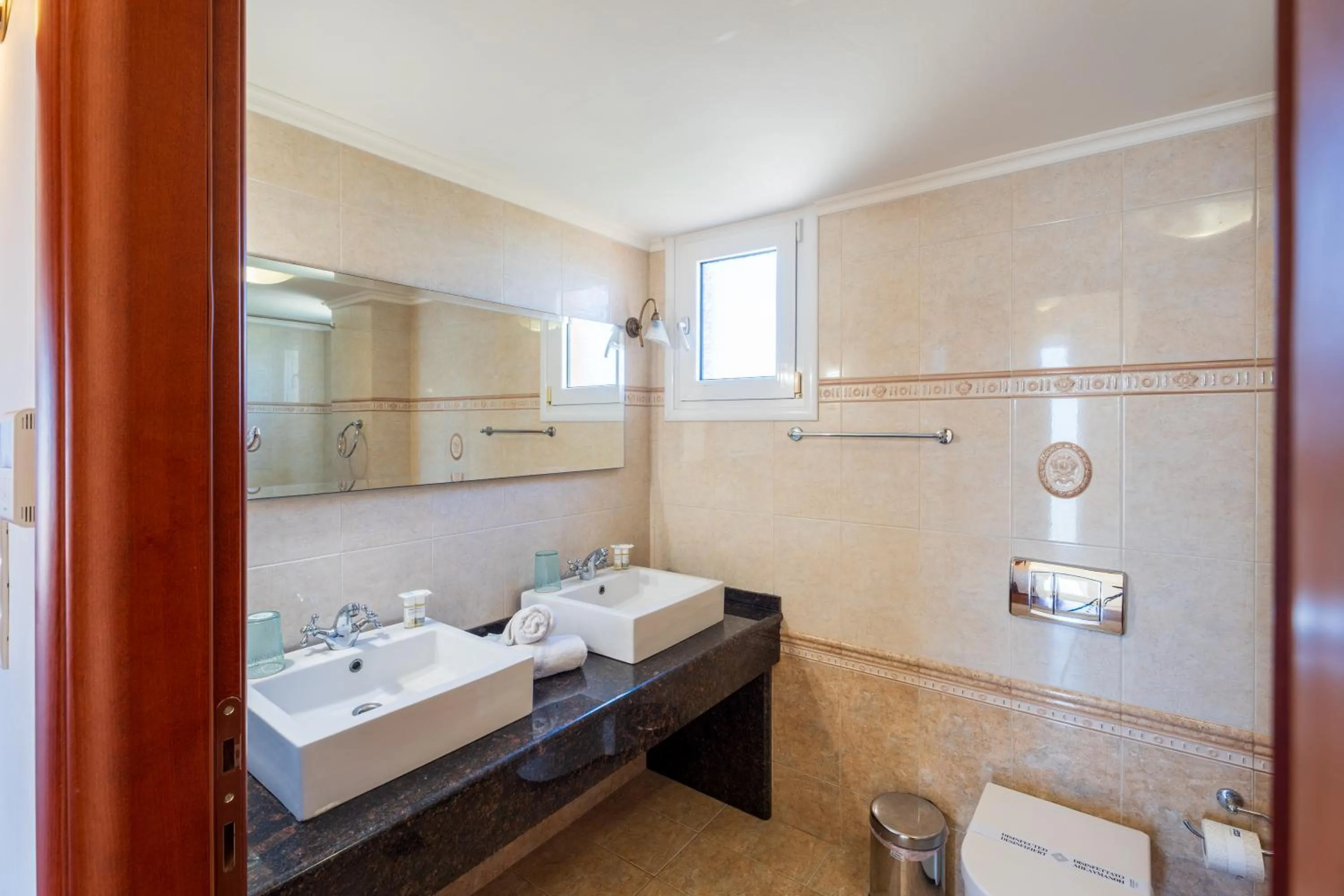 Bathroom in Gouves Bay by Omilos Hotels