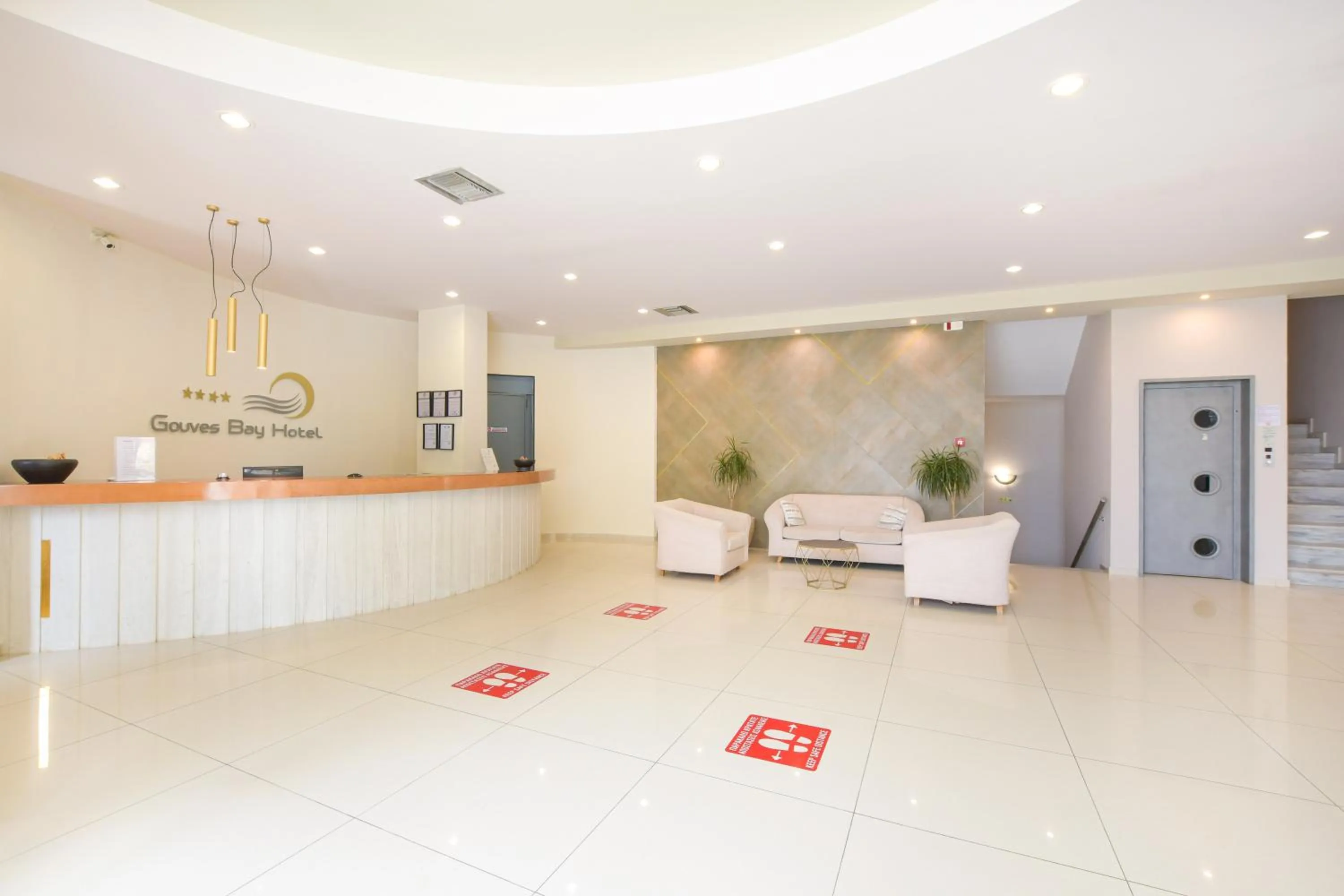 Living room in Gouves Bay by Omilos Hotels