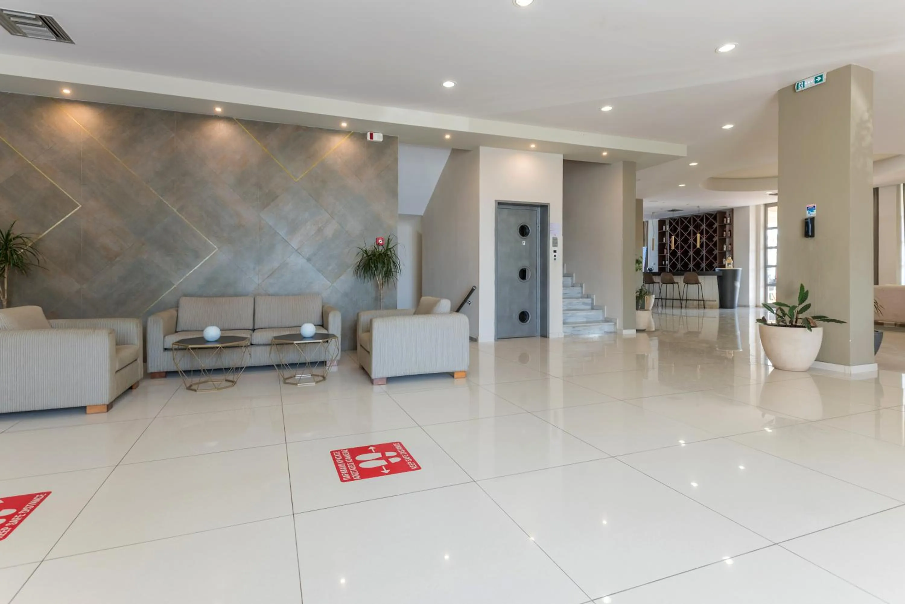 Living room in Gouves Bay by Omilos Hotels