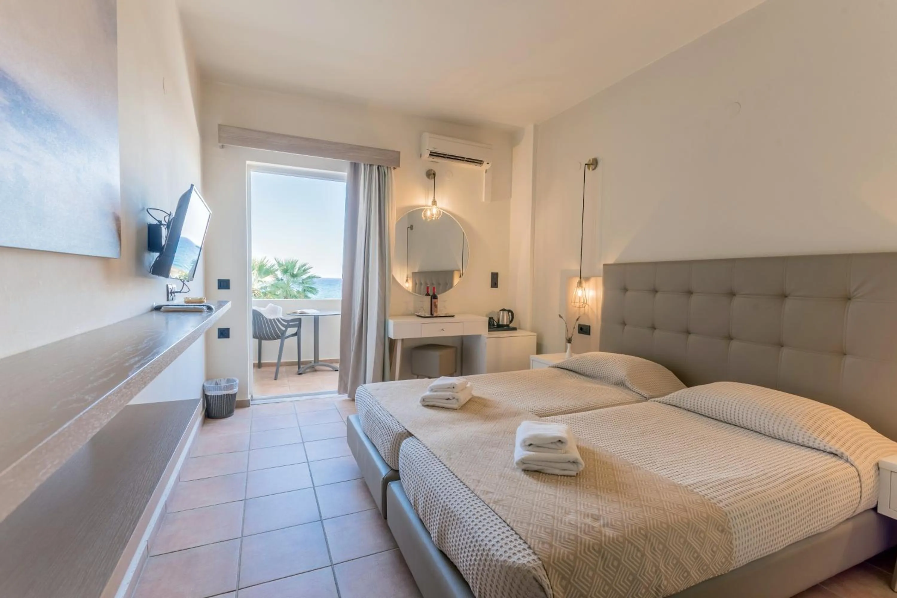 Bed in Gouves Bay by Omilos Hotels