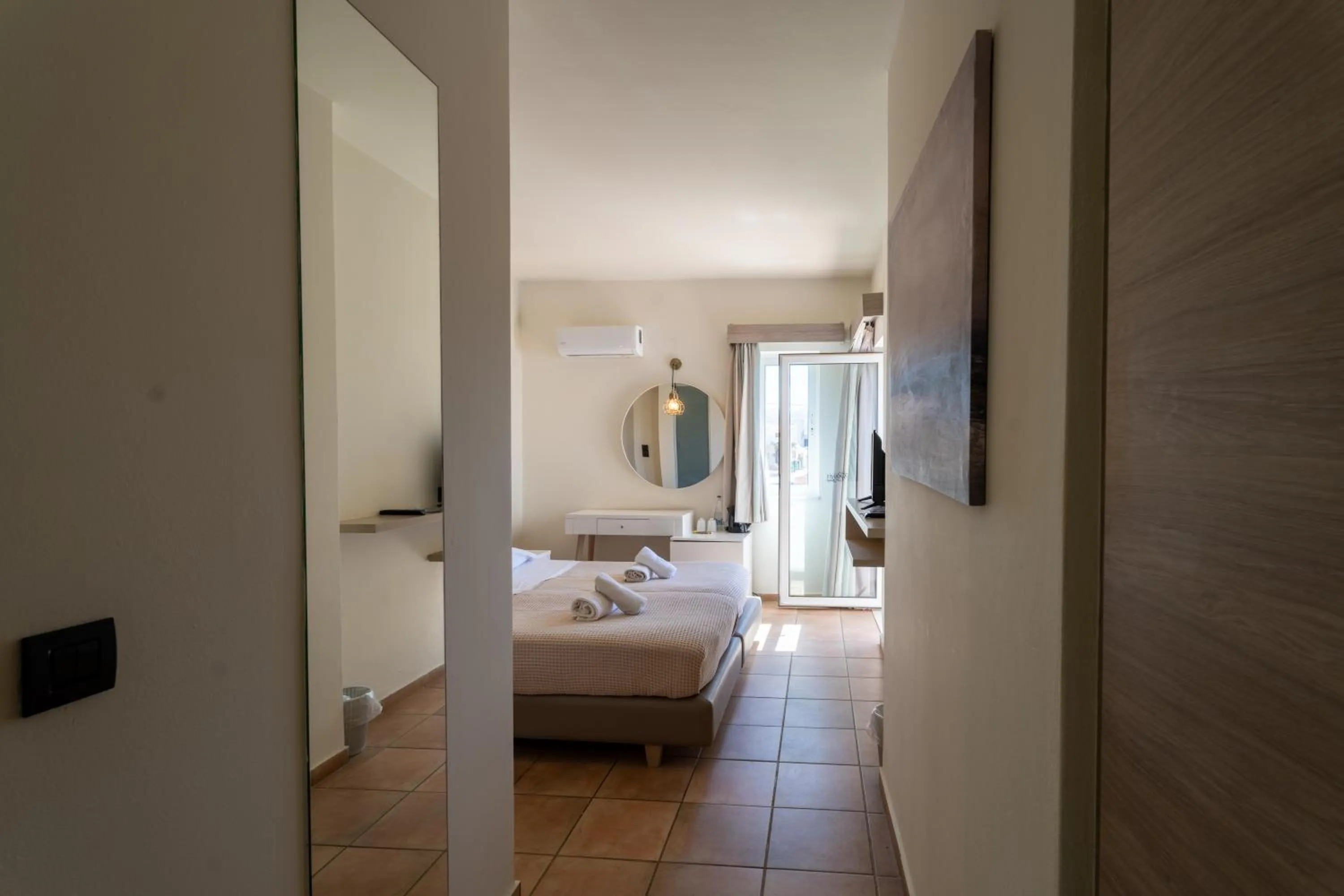 Bedroom, Bed in Gouves Bay by Omilos Hotels