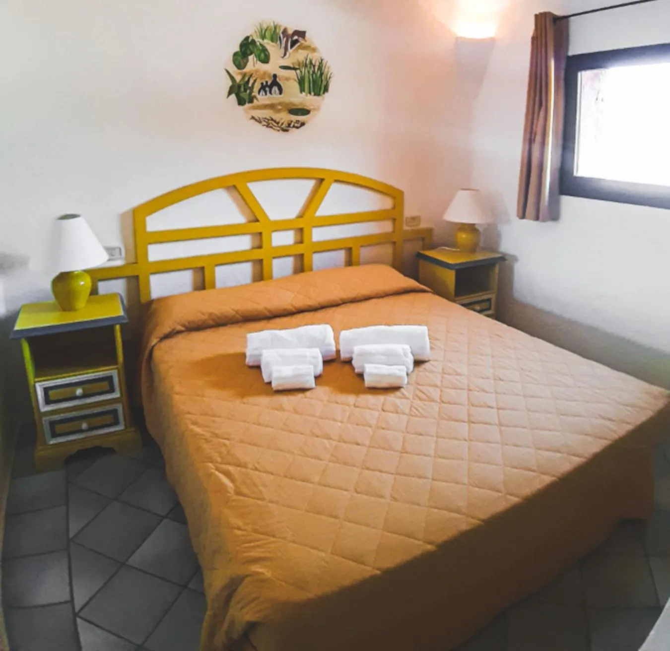 Photo of the whole room, Bed in Residence I Cormorani Bis