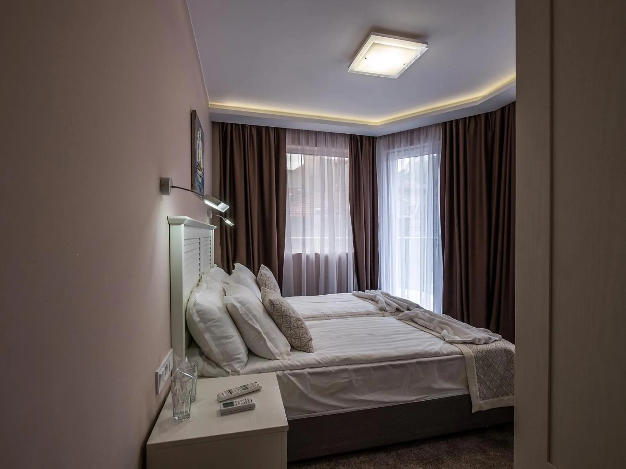 Bed in Caro Apartments & Rooms