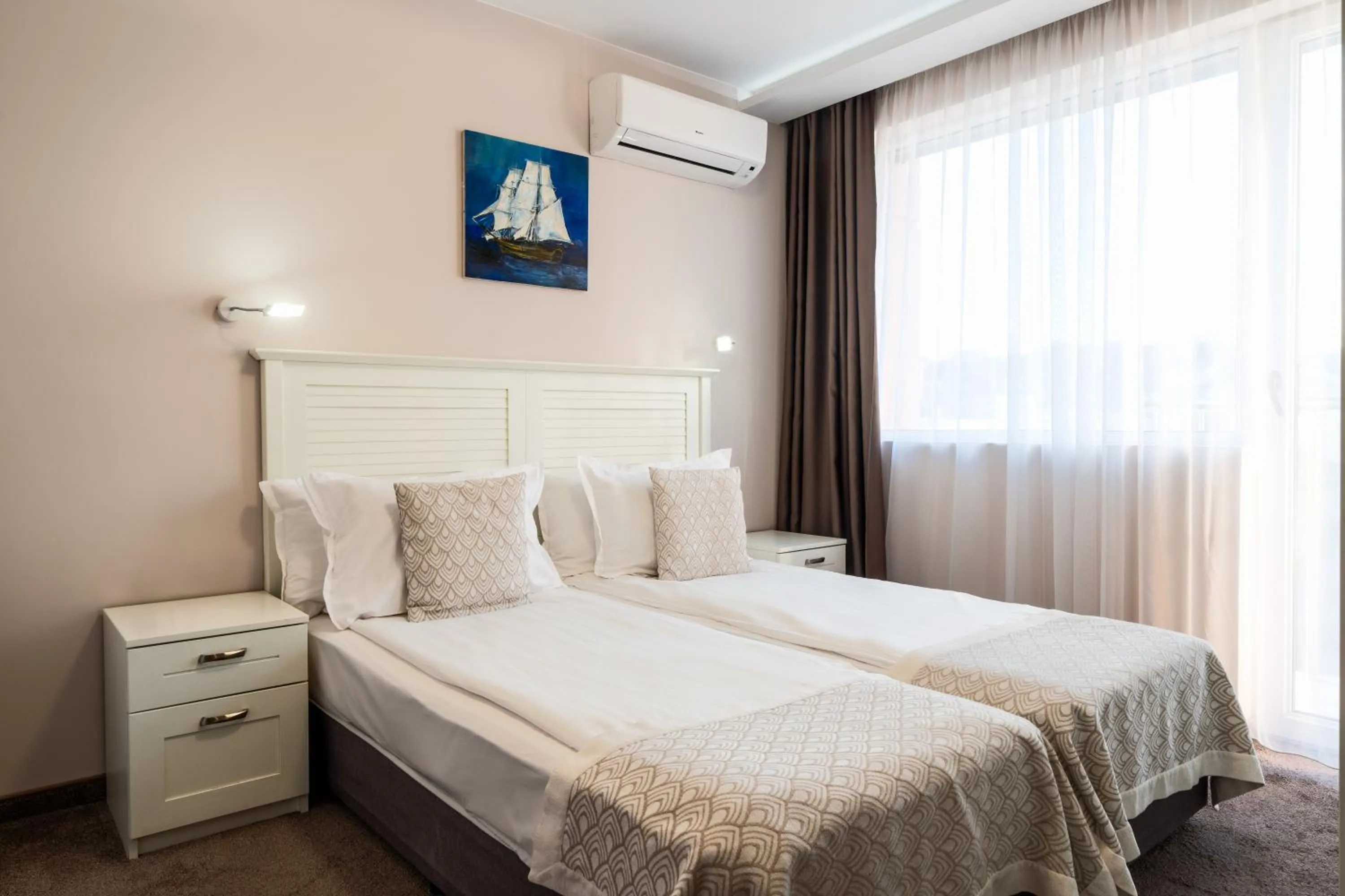 Bed in Caro Apartments & Rooms