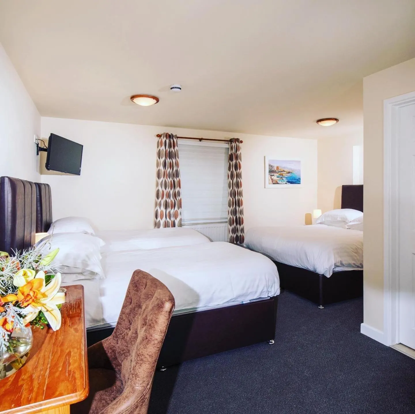 Bed in The Cock Inn Hotel