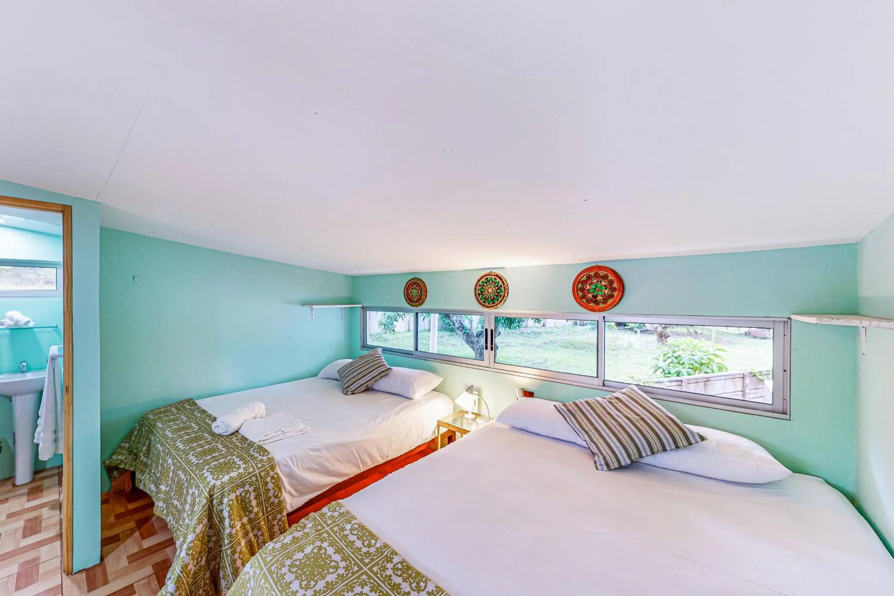 Bed in Nueva Villa Paraíso Four Villas