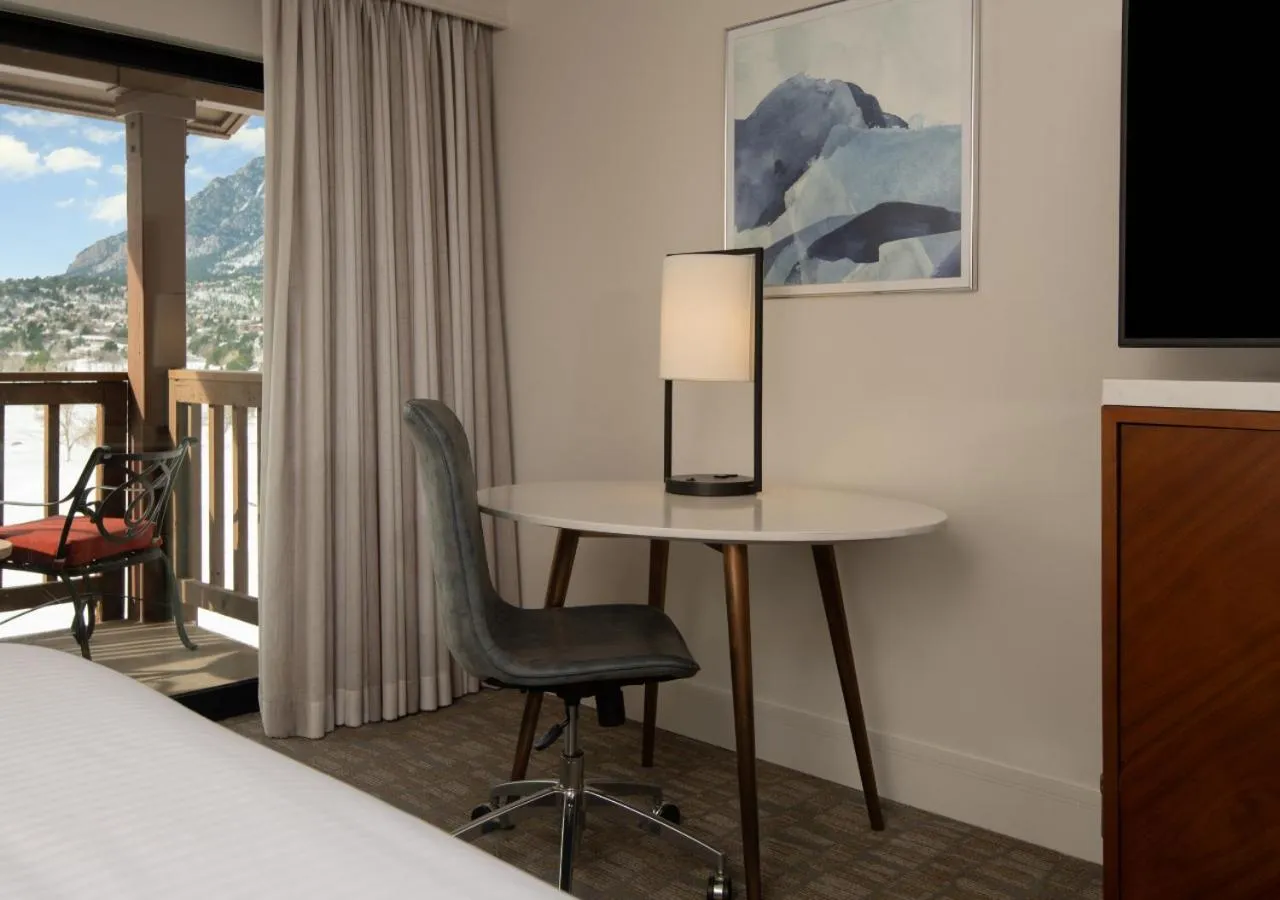 Seating area, Bed in Cheyenne Mountain Resort, a Destination by Hyatt Hotels
