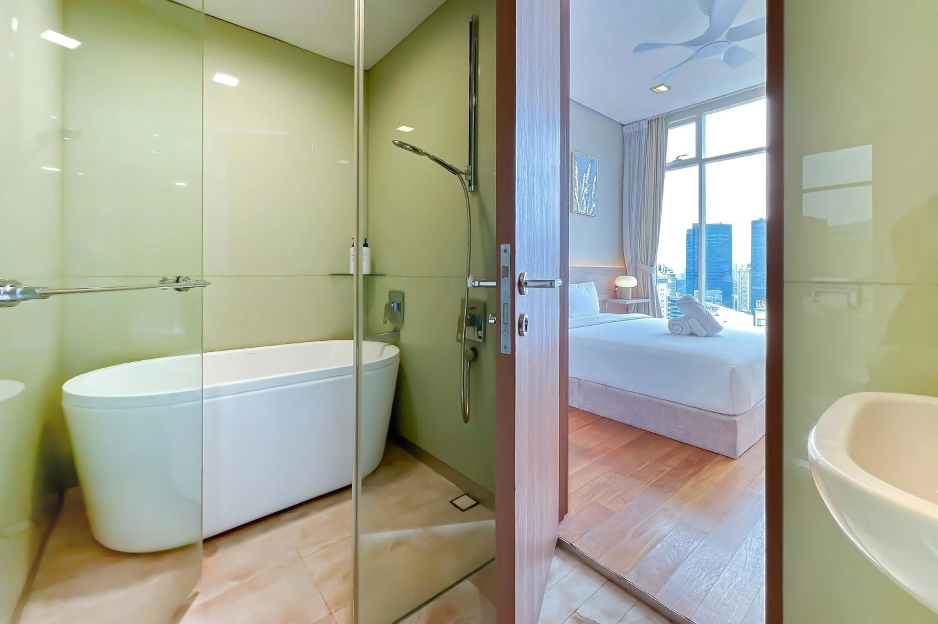 Bathroom, Bed in Soho Suites KLCC by Leala