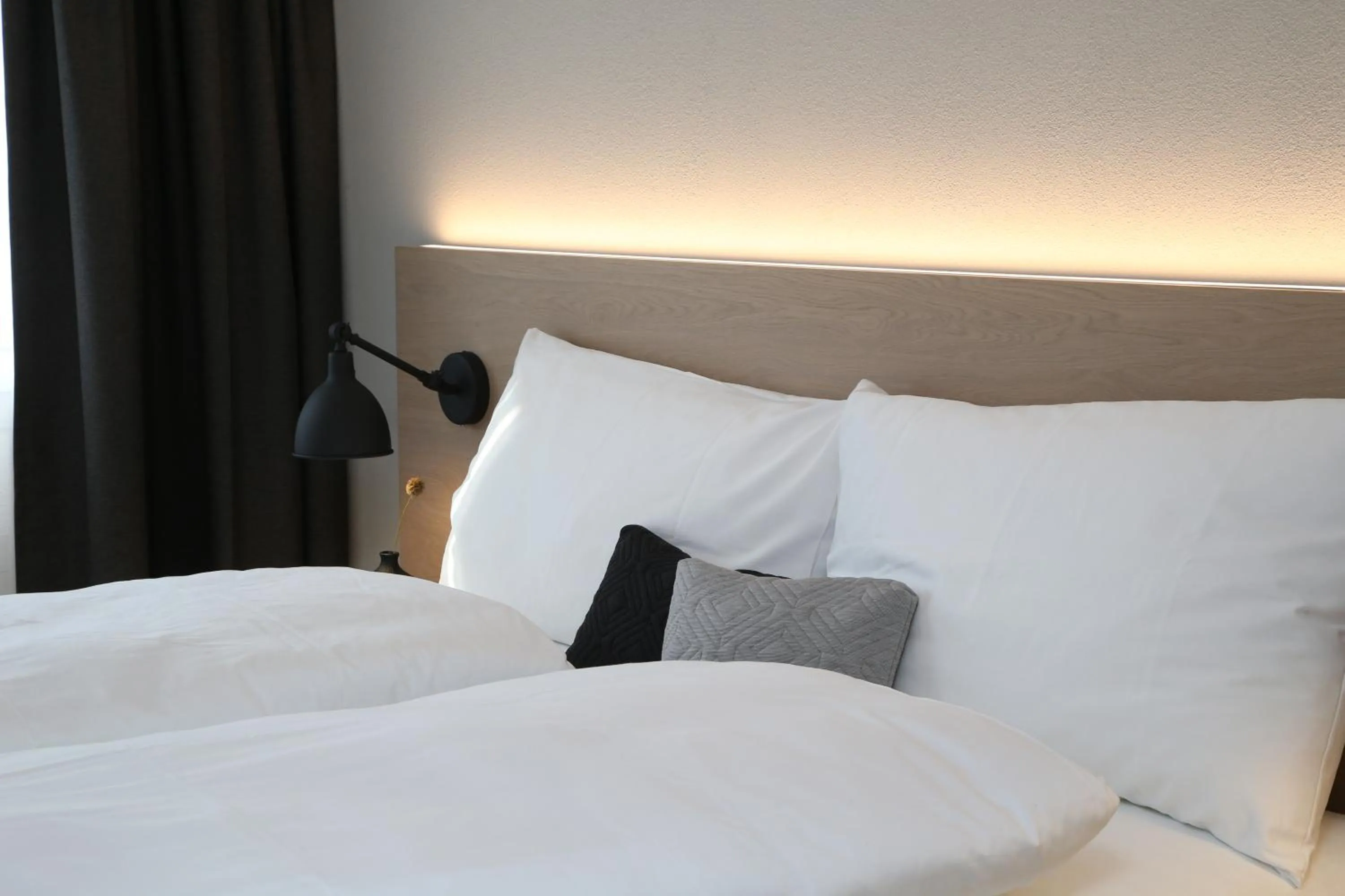 Decorative detail, Bed in Businesshotel Forum Widnau