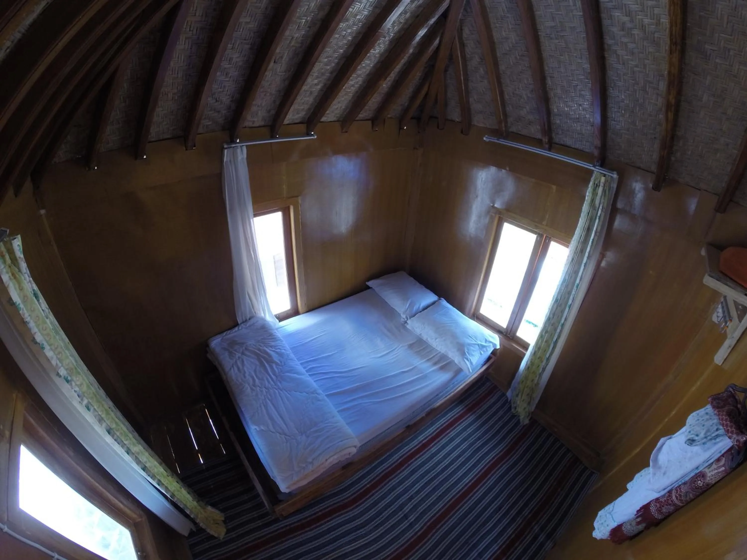 Bed in Bale Sembahulun Cottages & Tend