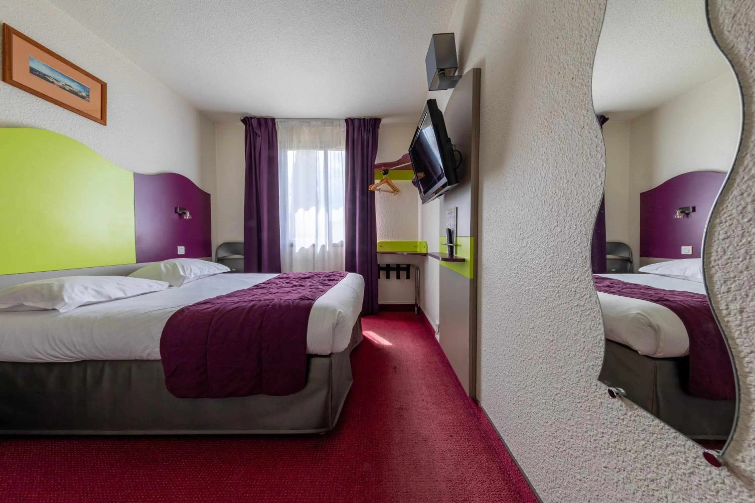 Bedroom, Bed in Logis Hotel Noemys pont de l'Etoile