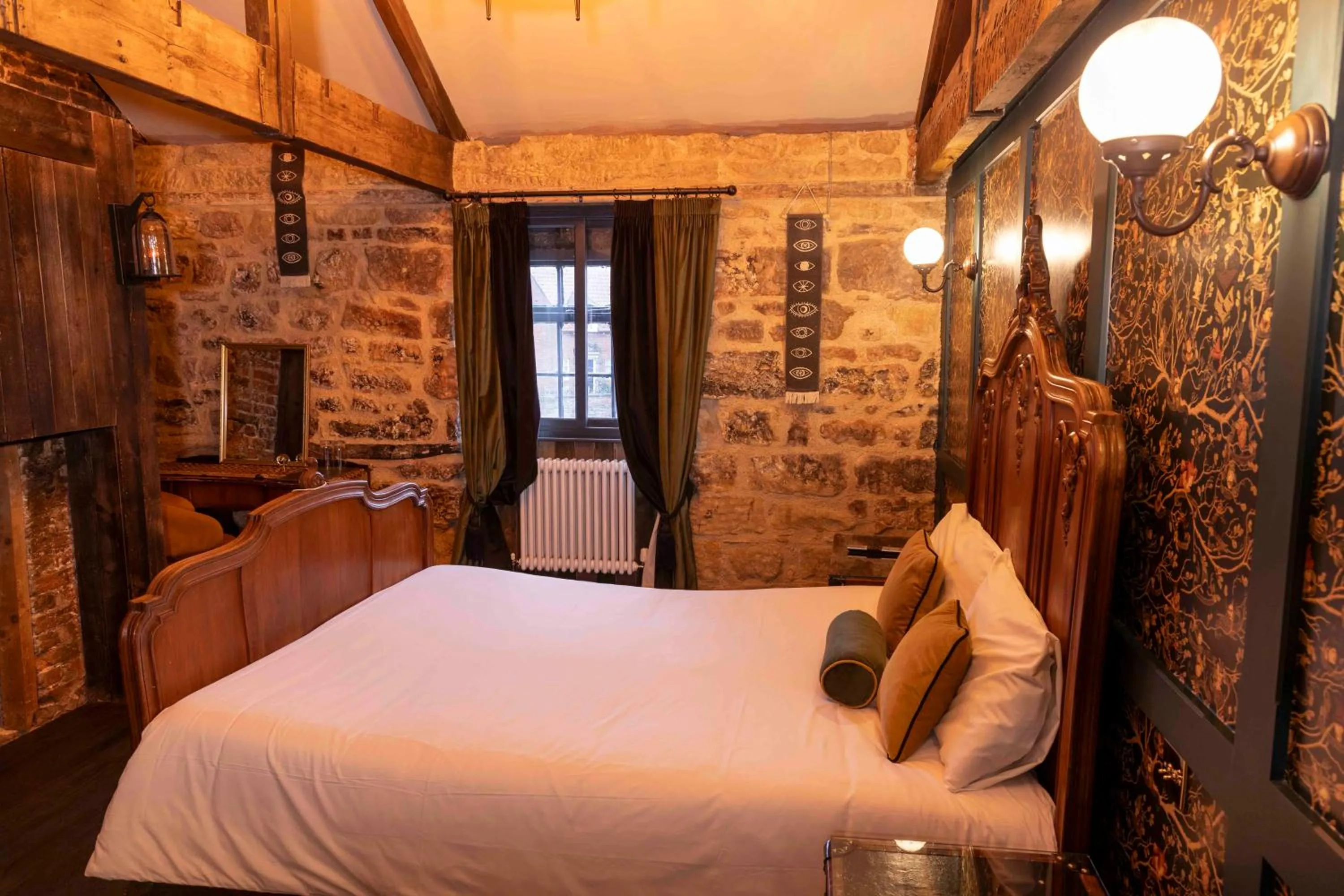 Bed in The Dirty Bottles Hotel