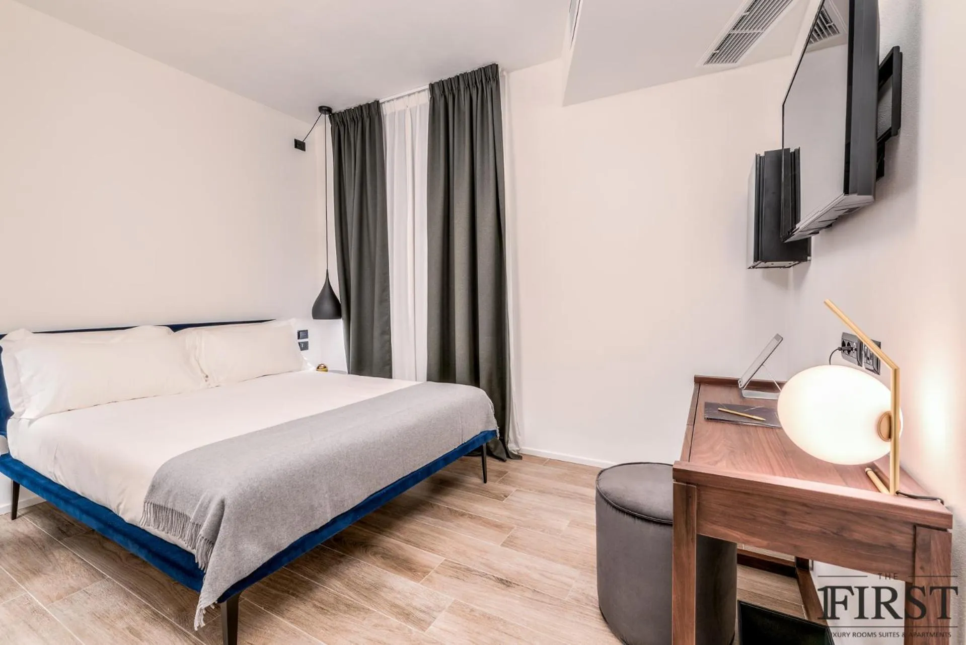 Photo of the whole room, Bed in La Spezia by The First - Luxury Rooms & Suites