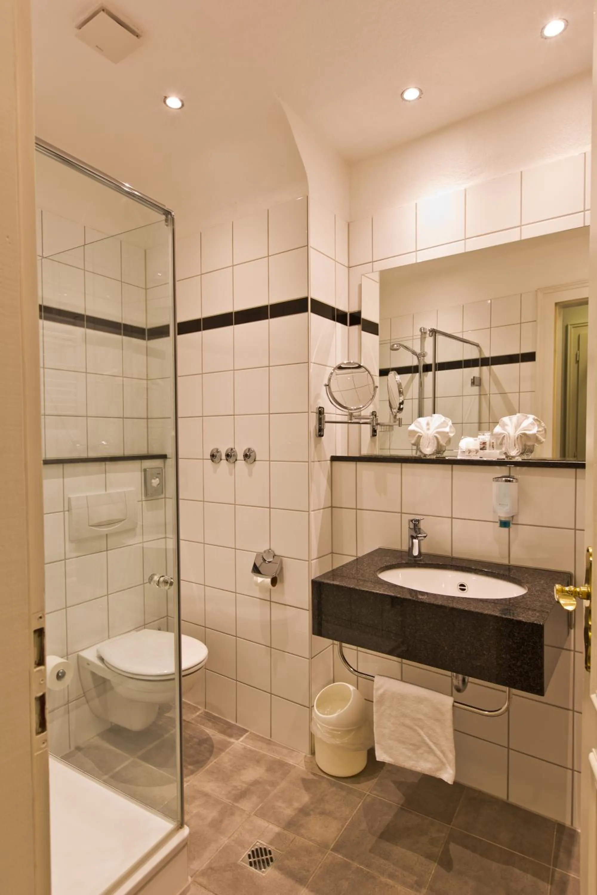 Bathroom in Astor & Aparthotel