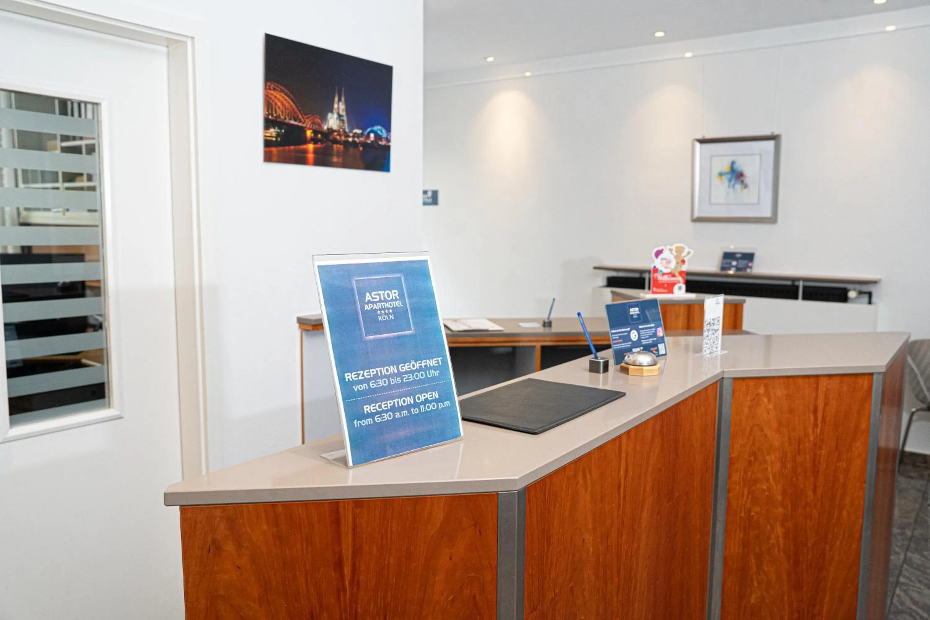 Lobby or reception in Astor & Aparthotel