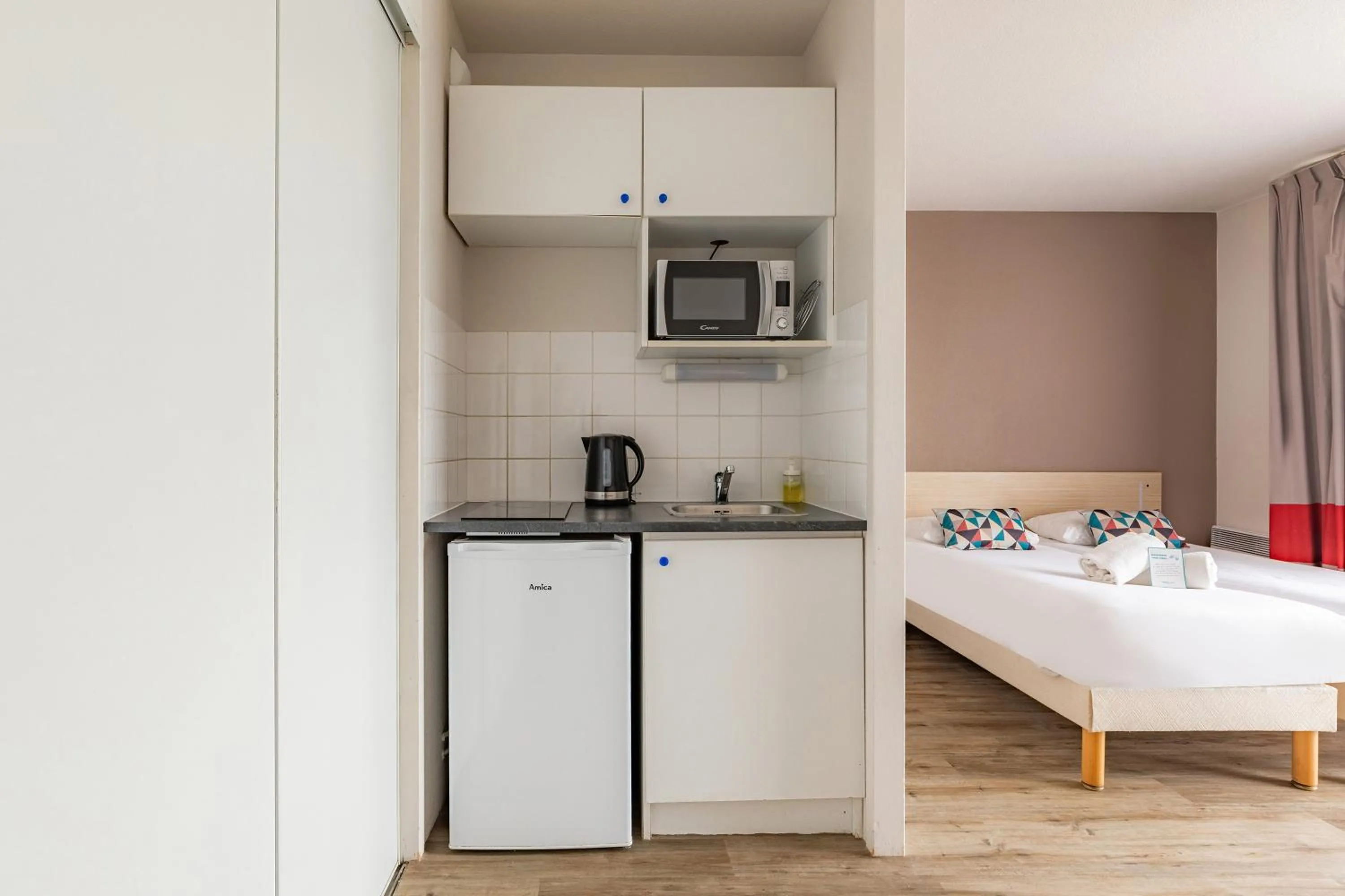 Bed in Appart'City Classic La Rochelle Centre