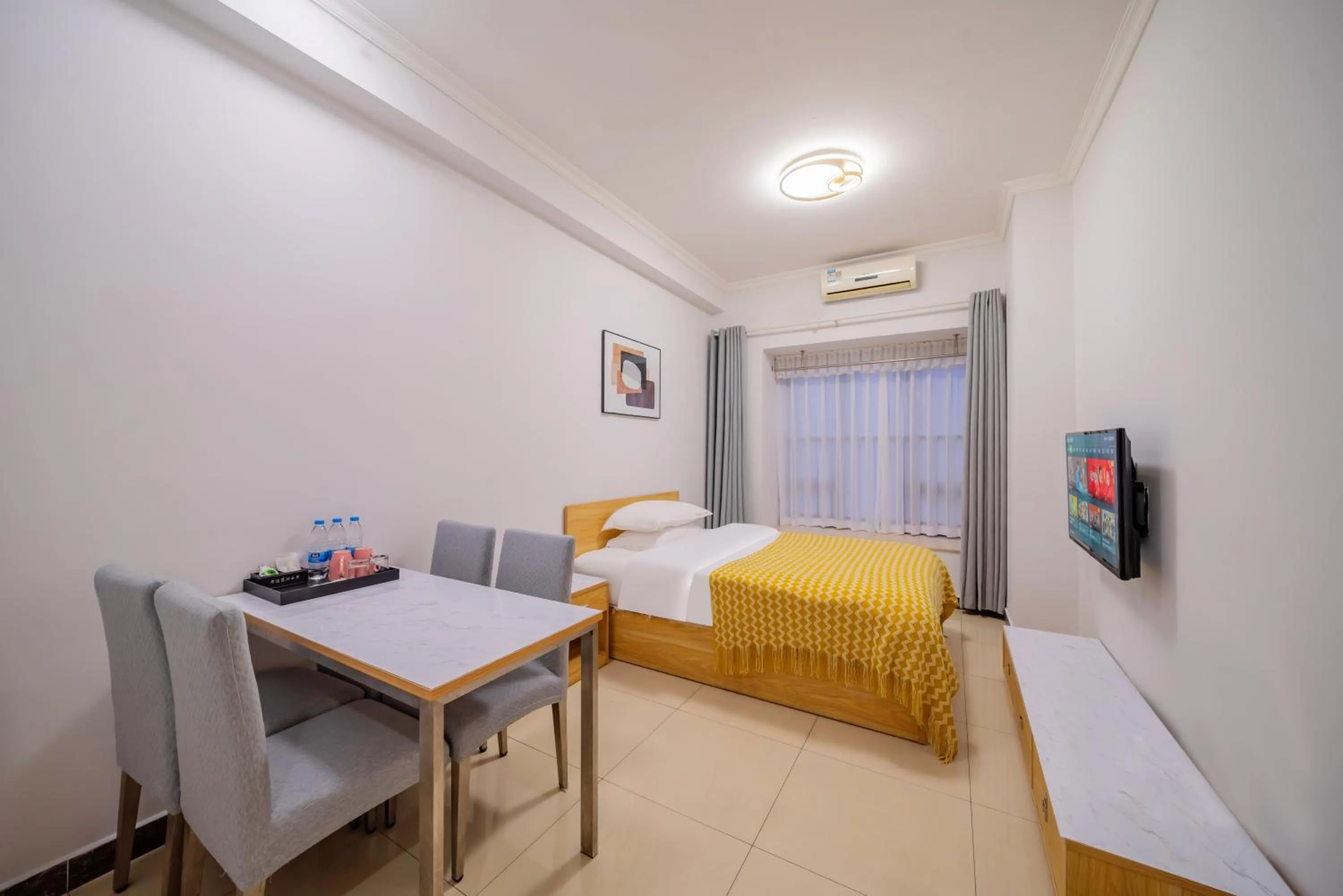 Bed in Pazhou Angda International Aparthotel Canton Fair Branch