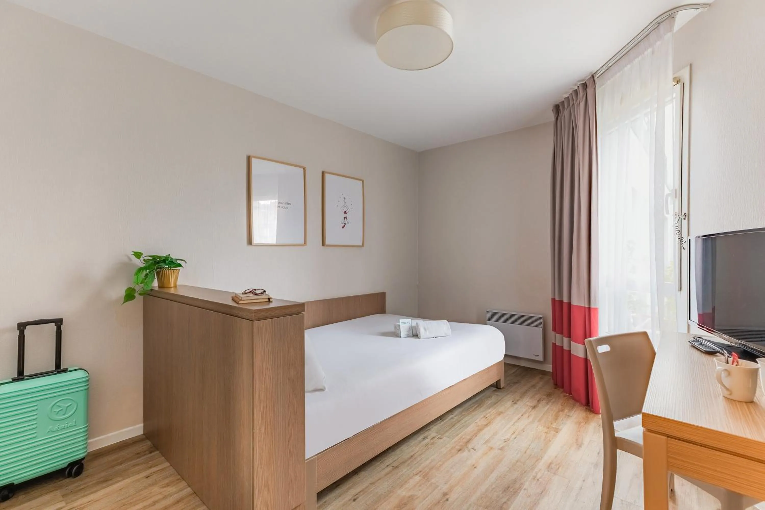 Bed in Appart'City Classic Nantes Quais de Loire