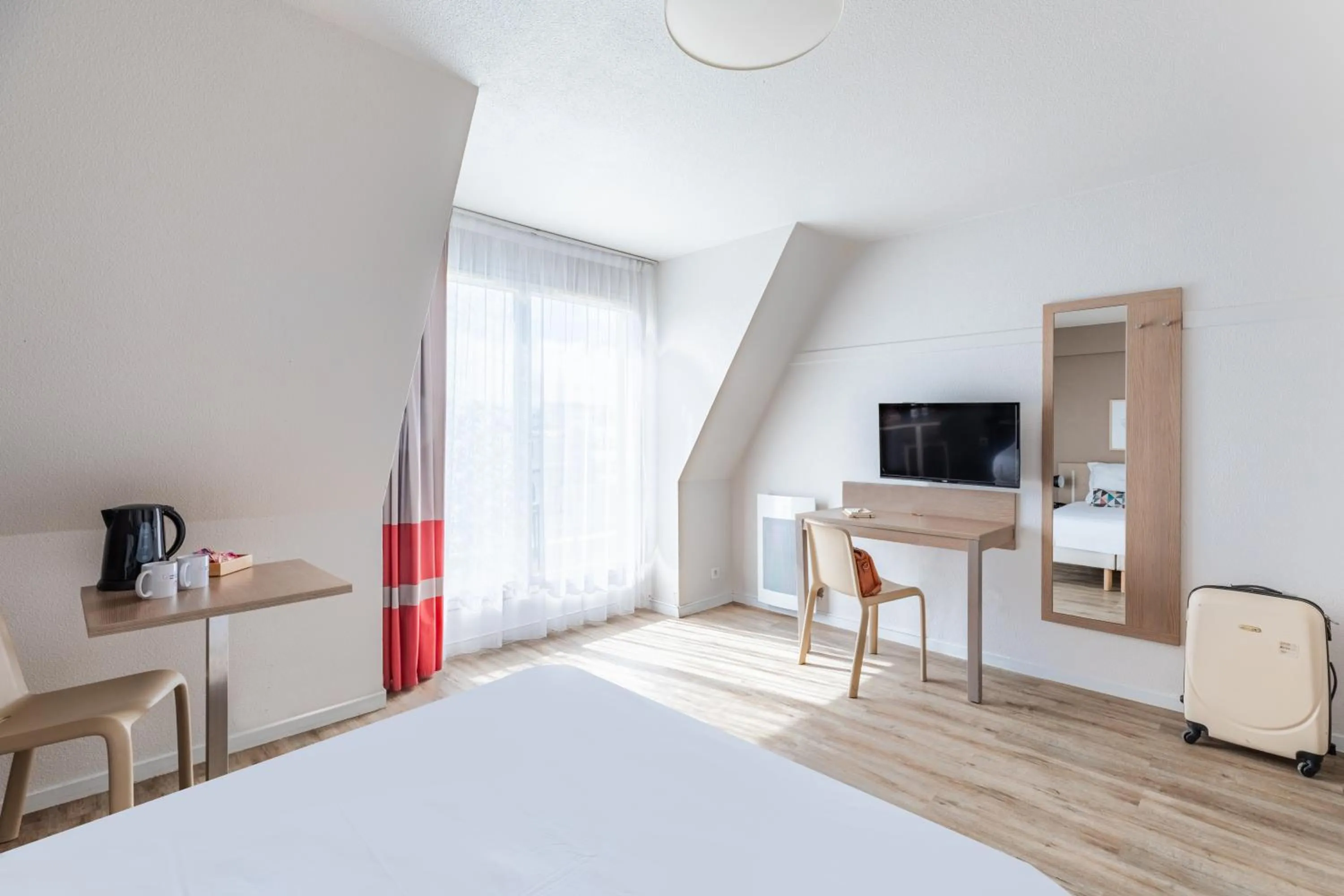 Bed in Appart'City Classic Paris La Villette