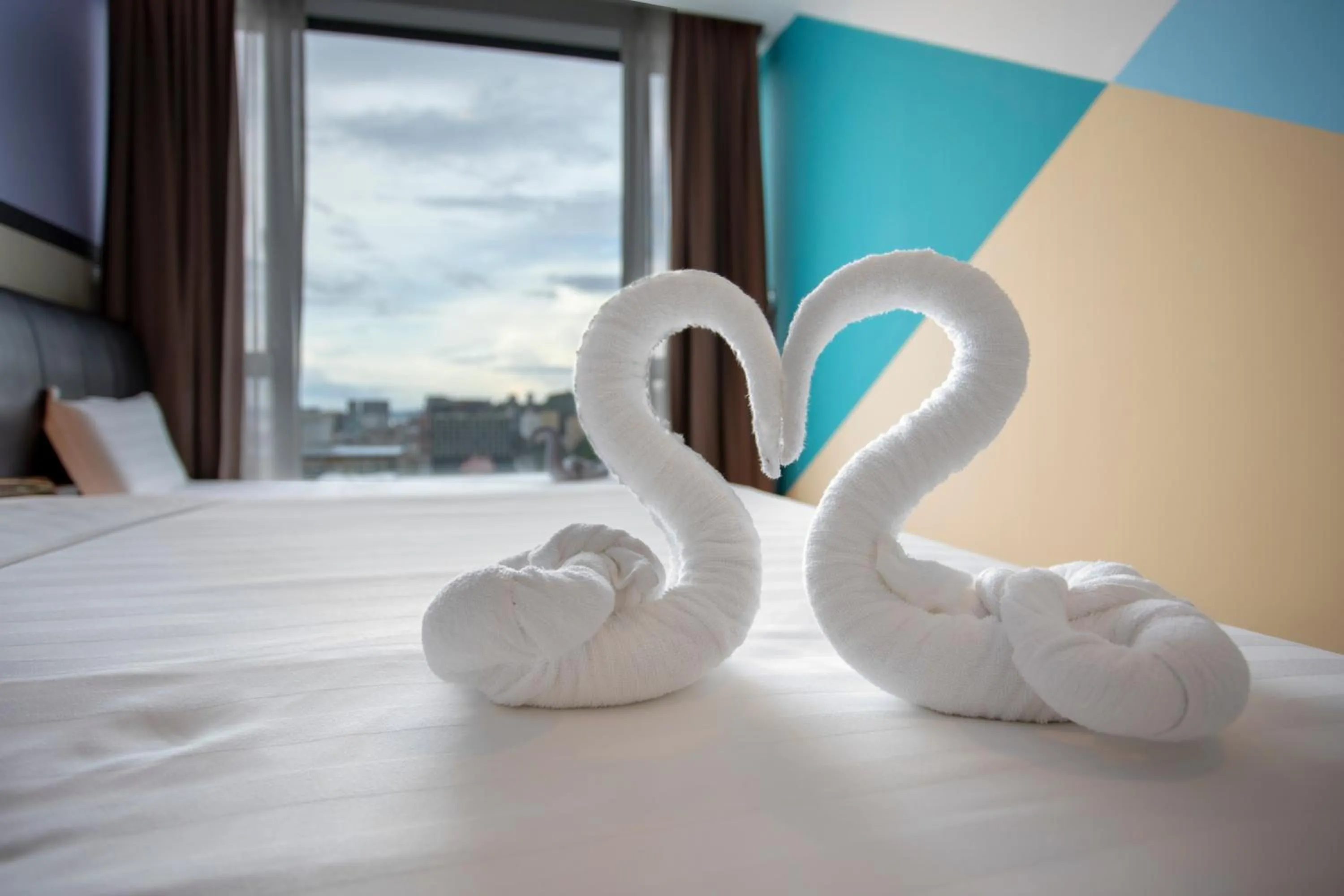 Decorative detail, Bed in Cozy Living Sky Apartment