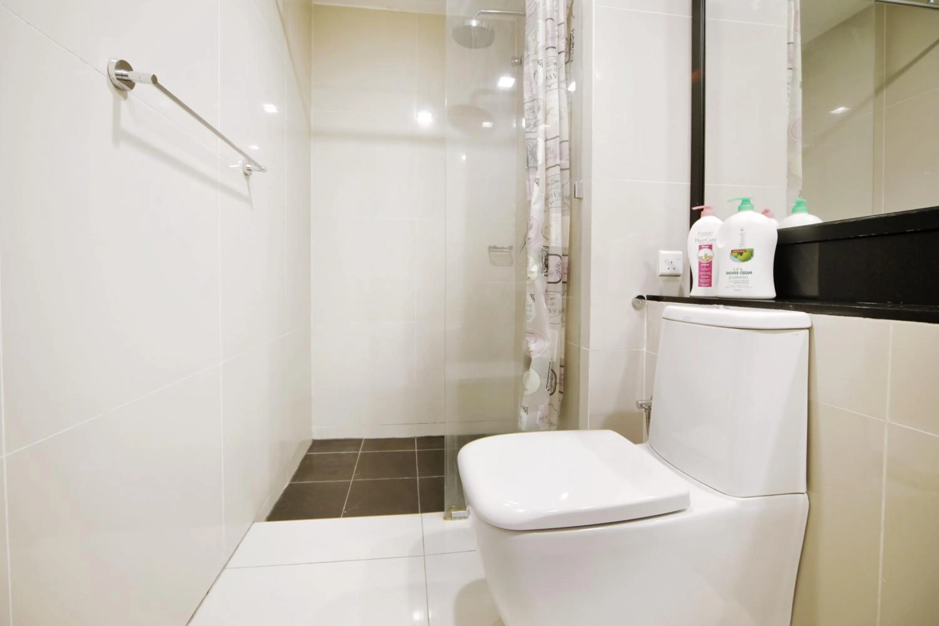 Toilet in Cozy Living Sky Apartment