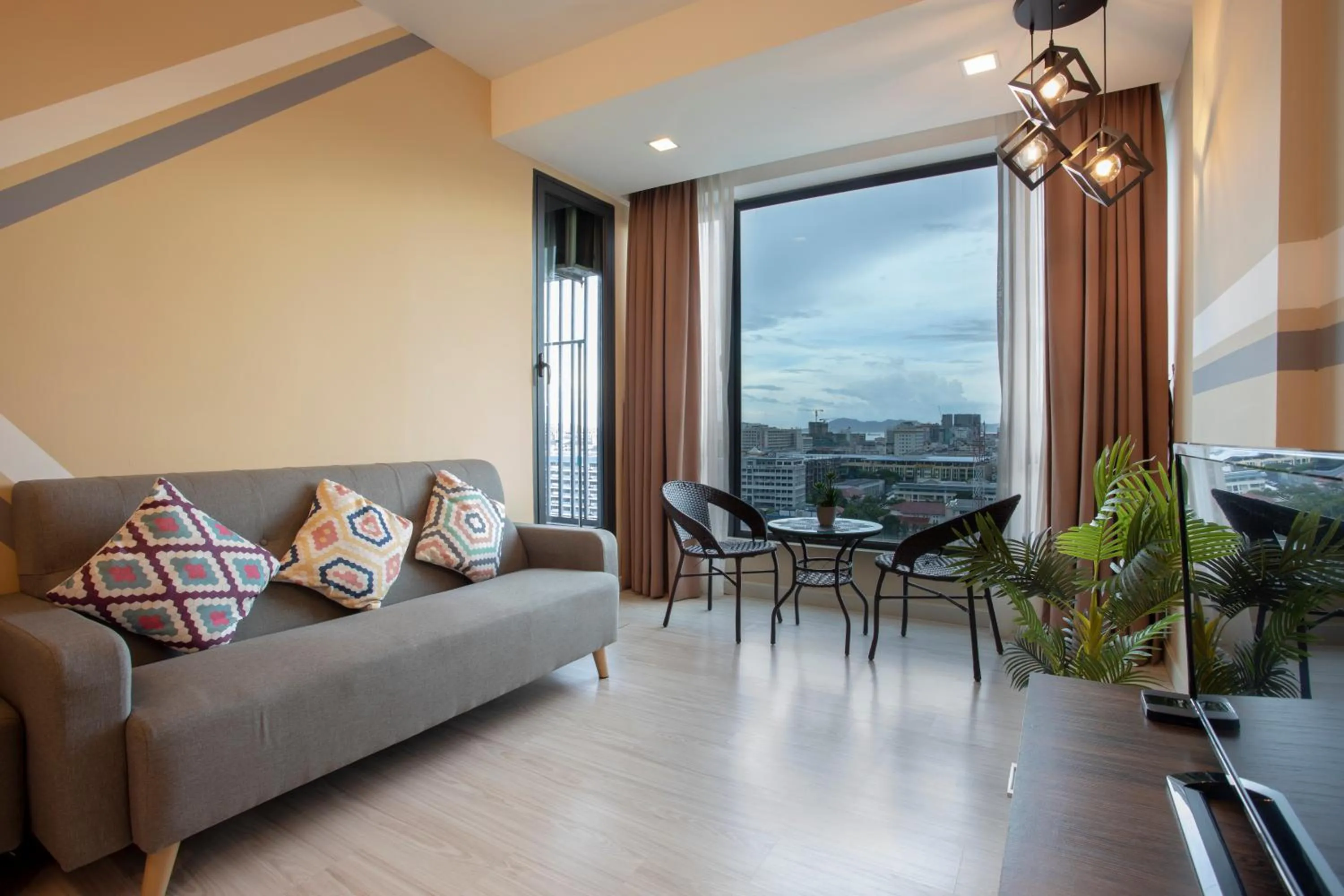 Living room in Cozy Living Sky Apartment