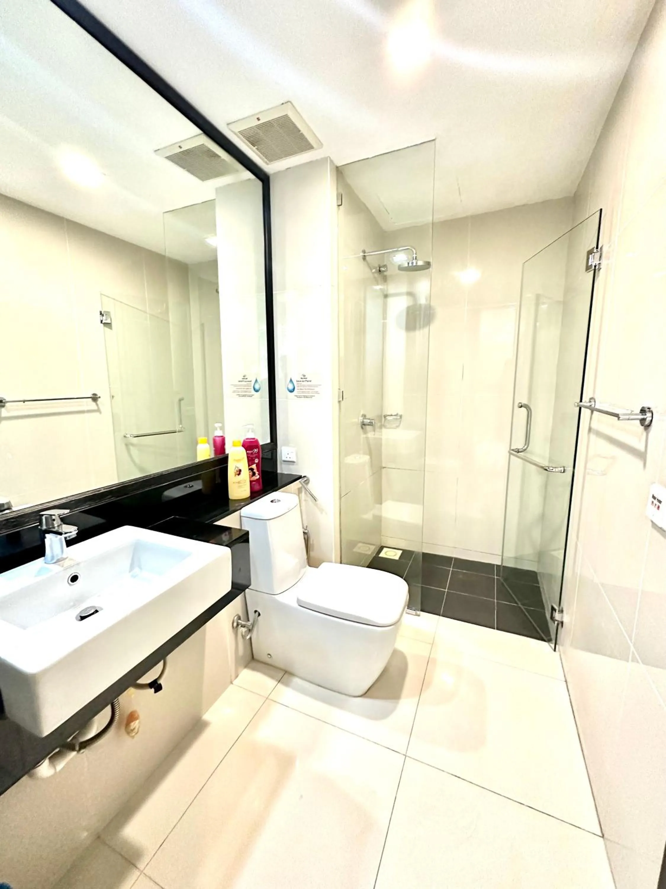 Toilet in Cozy Living Sky Apartment