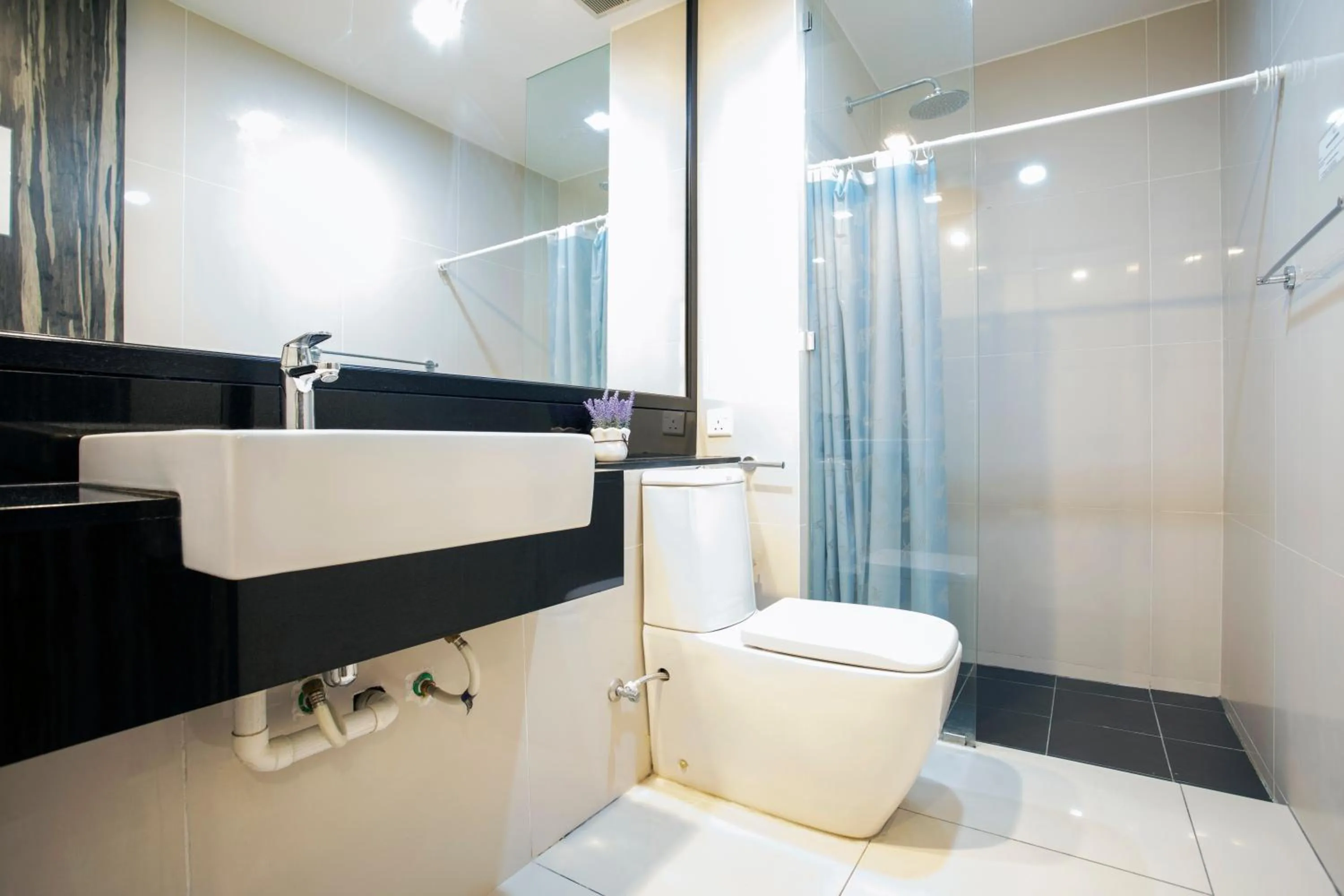 Toilet in Cozy Living Sky Apartment