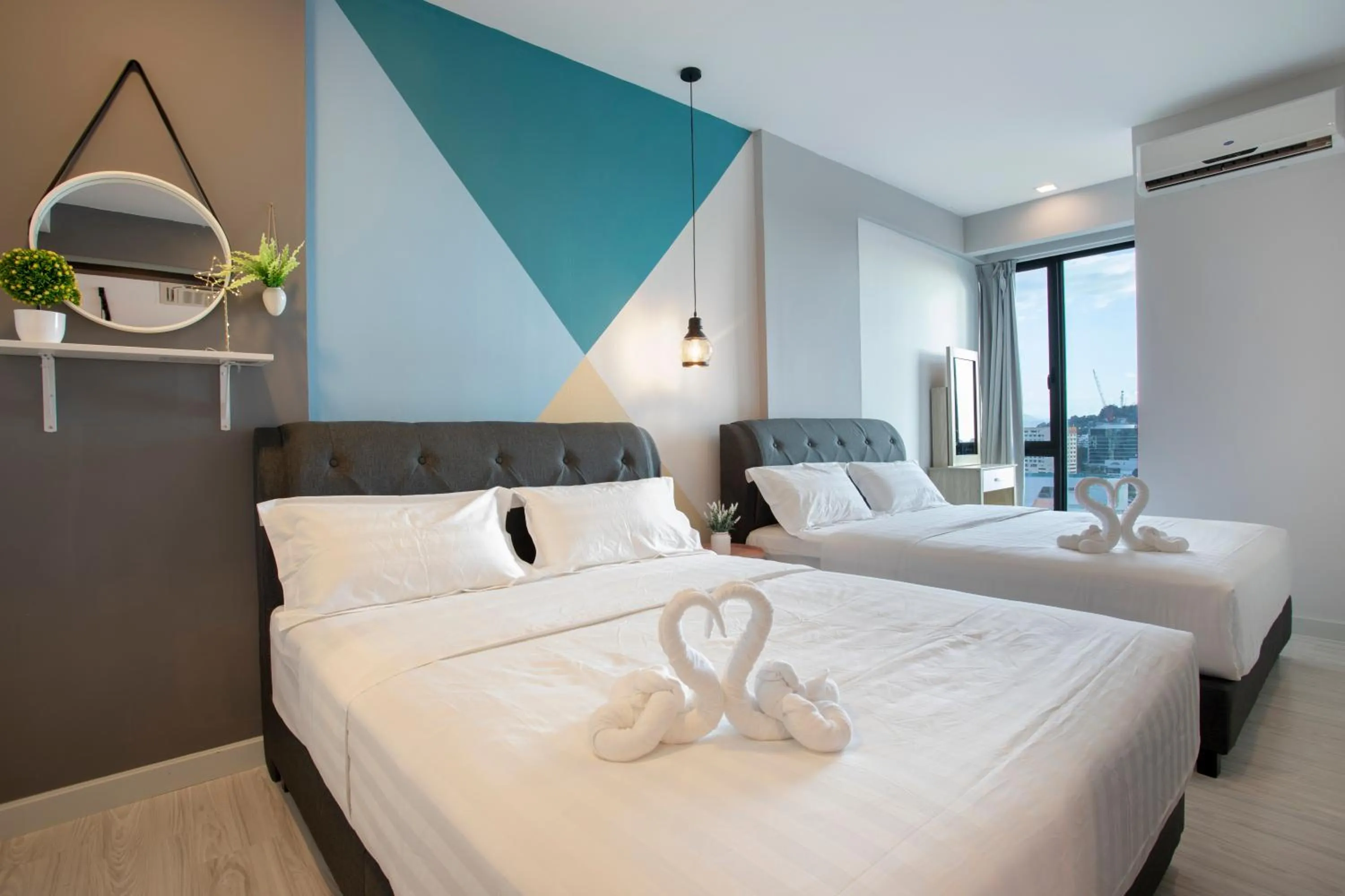 Bed in Cozy Living Sky Apartment