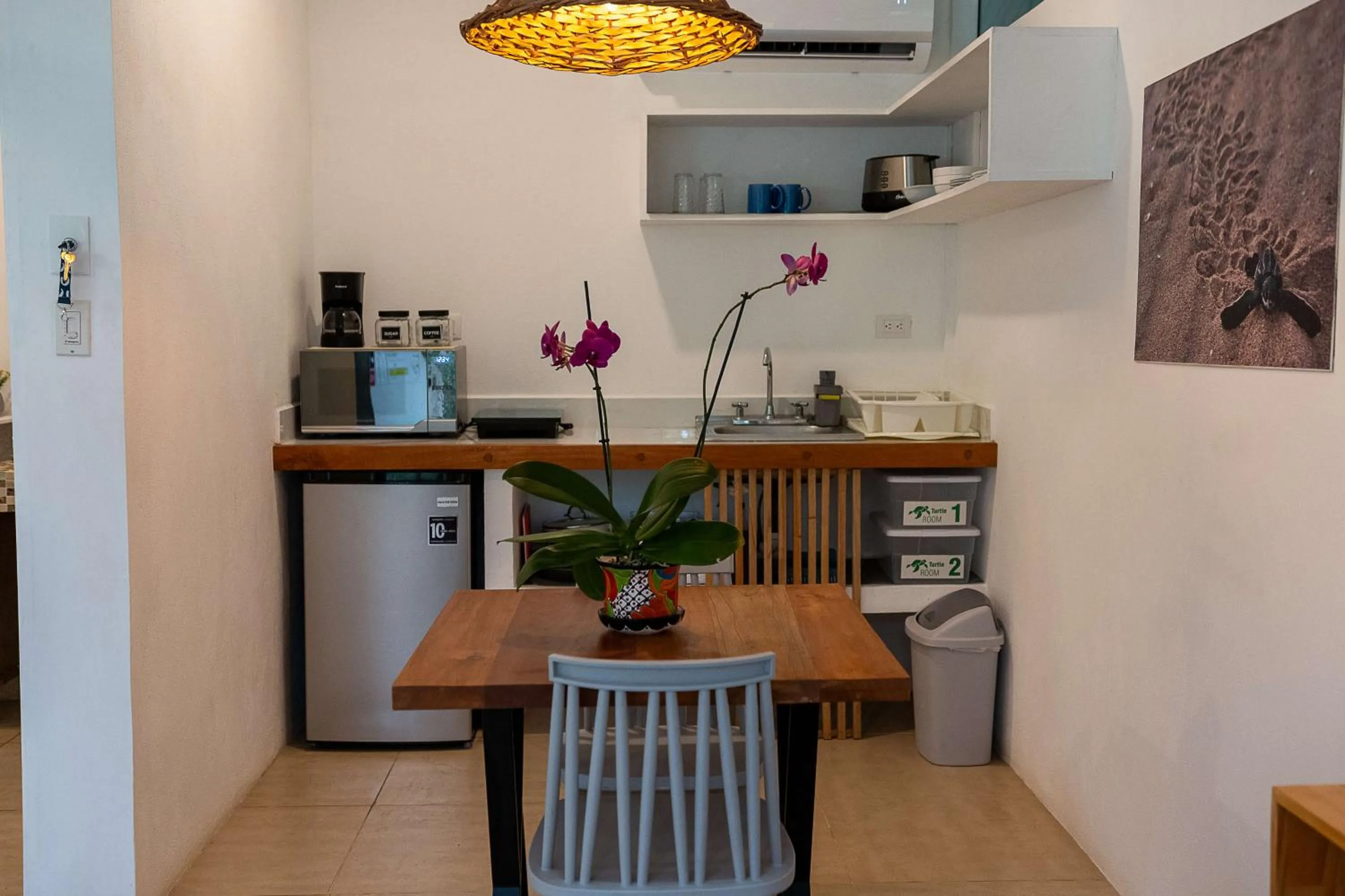 Kitchen or kitchenette in Jaguar Inn Bungalows